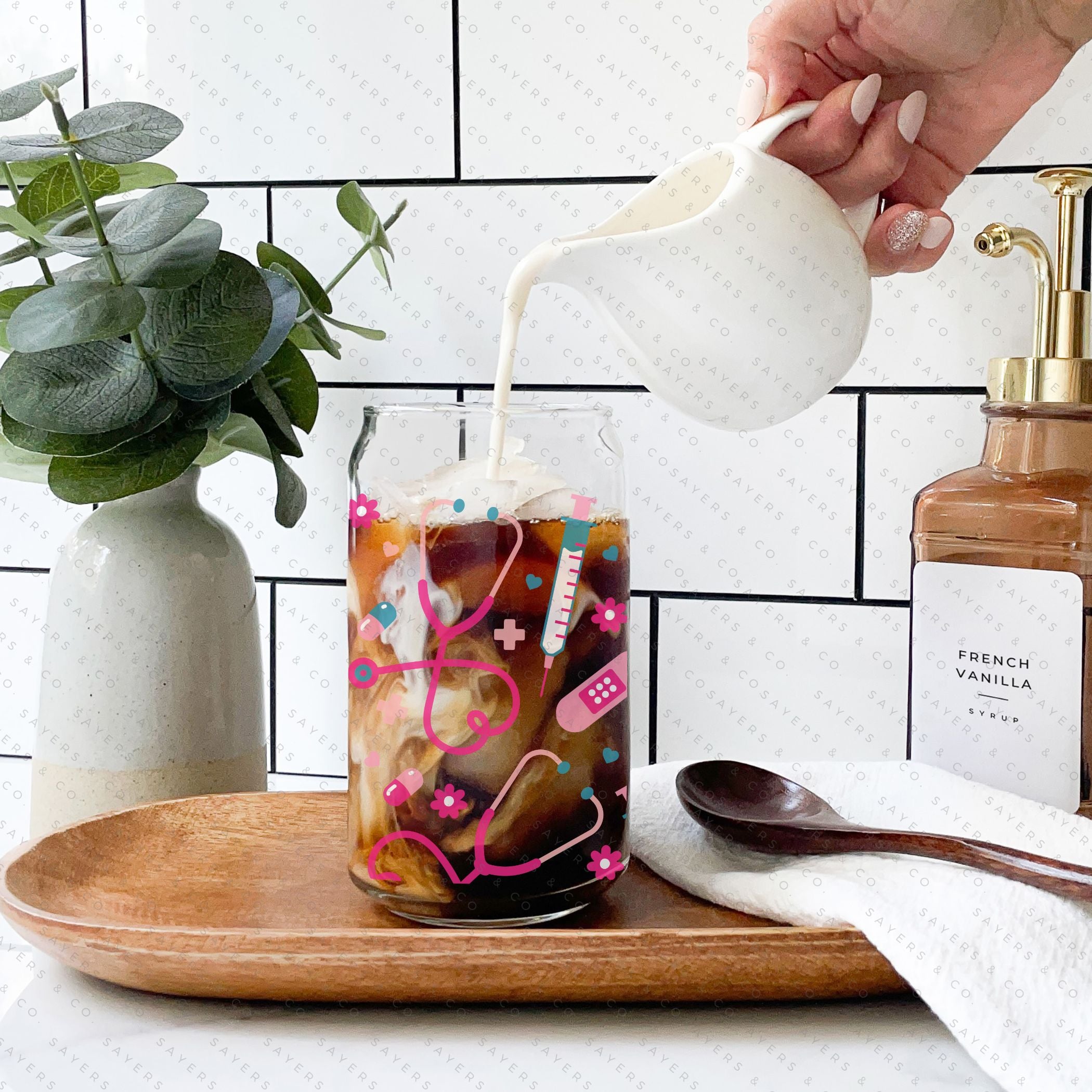 16oz Nifty Nurse Glass Cup with bamboo lid and straw, featuring a fun design perfect for nurses.