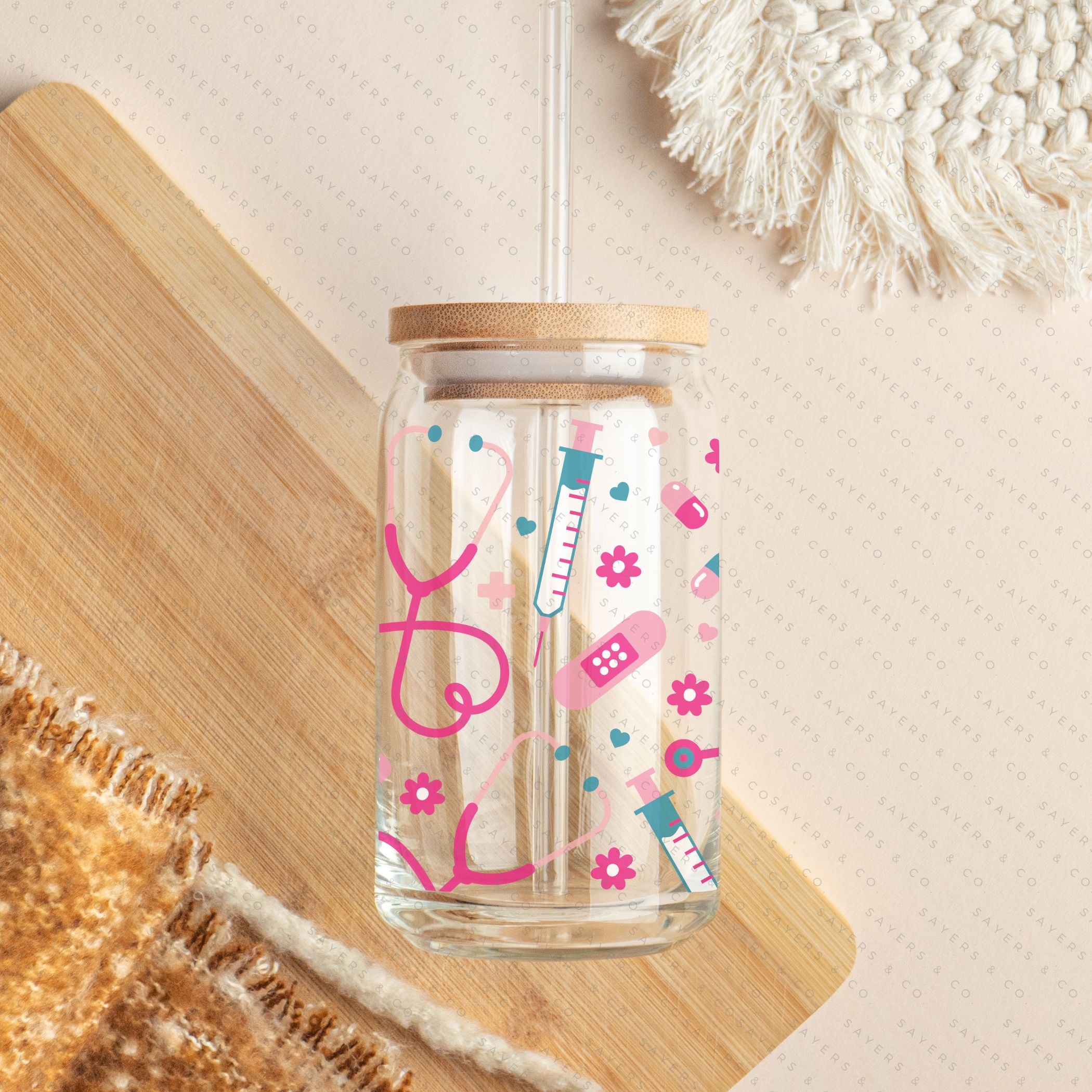 16oz Nifty Nurse Glass Cup with bamboo lid and straw, featuring a fun design perfect for nurses.
