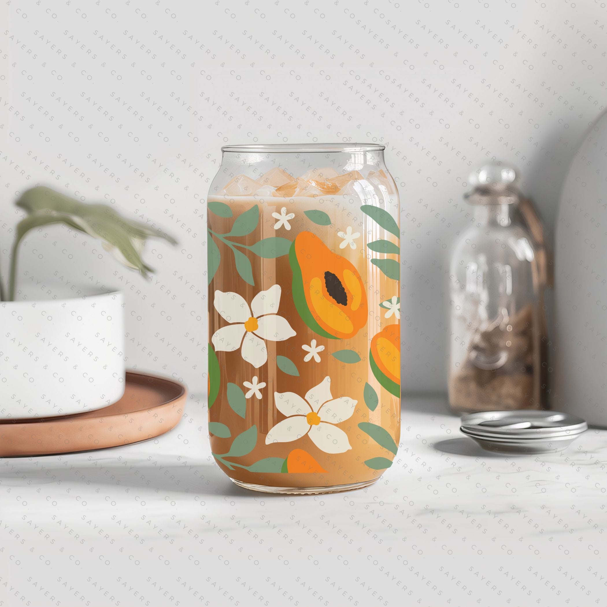 16oz Papaya Party Glass Cup with bamboo lid and straw, showcasing a vibrant papaya design, perfect for drinks.