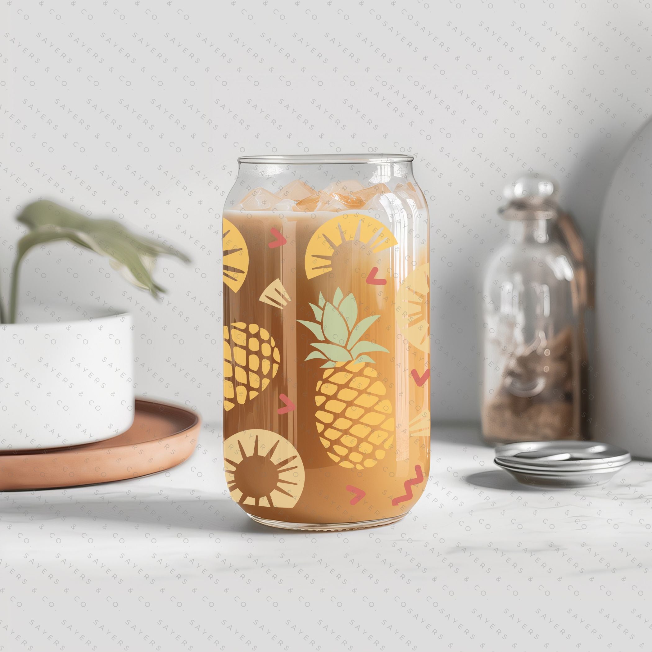 16oz Pineapple Express Glass Cup with bamboo lid and straw, featuring a tropical pineapple design, perfect for drinks.