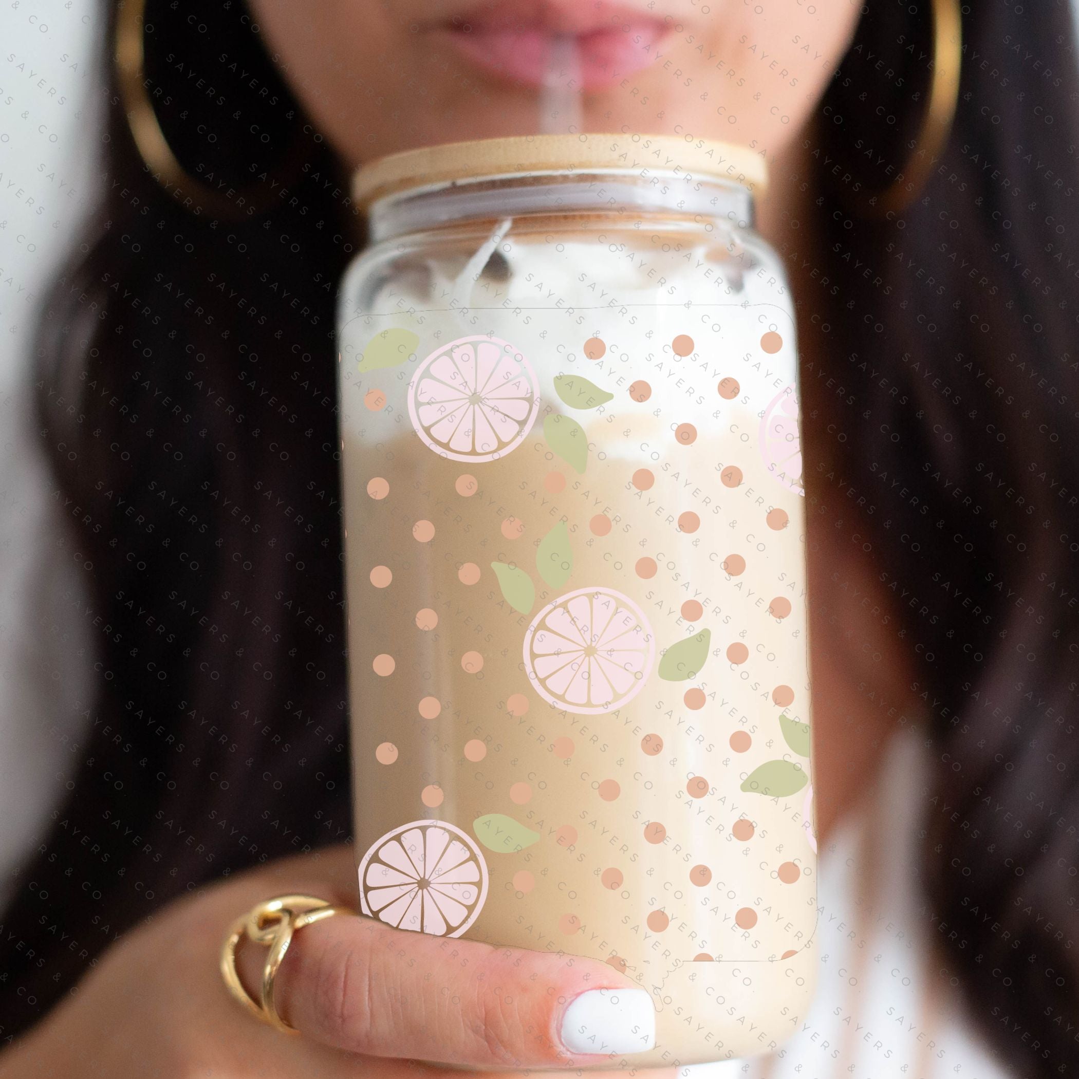 16oz Pink Lemonade Glass Cup with Bamboo Lid and Straw, showcasing a vibrant design perfect for summer drinks.