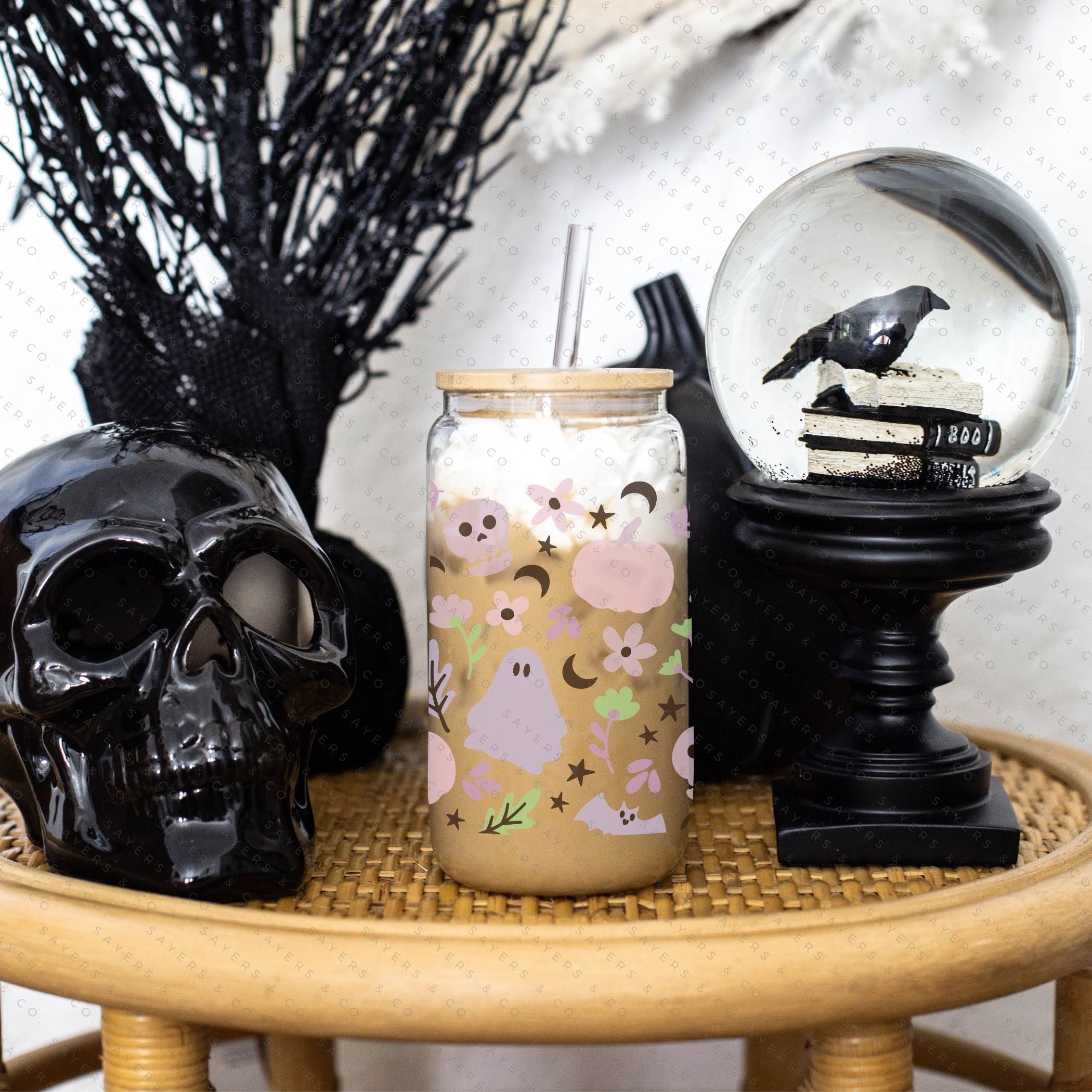 16oz Pretty Paranormal Glass Cup with bamboo lid and straw, featuring a unique design perfect for Halloween and other occasions.