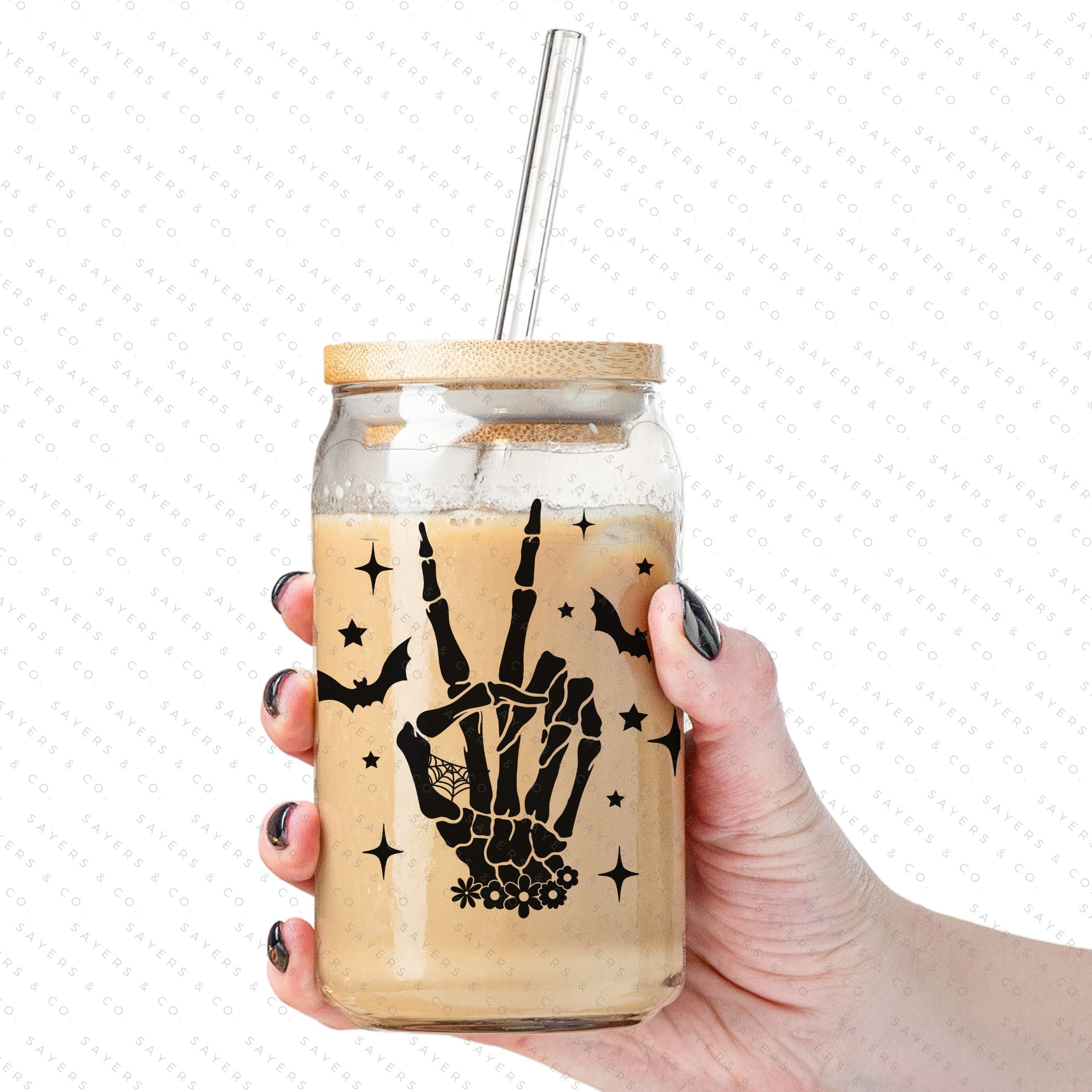 16oz Skeleton Peace Sign Glass Cup featuring a bamboo lid and straw, perfect for Halloween and everyday use.