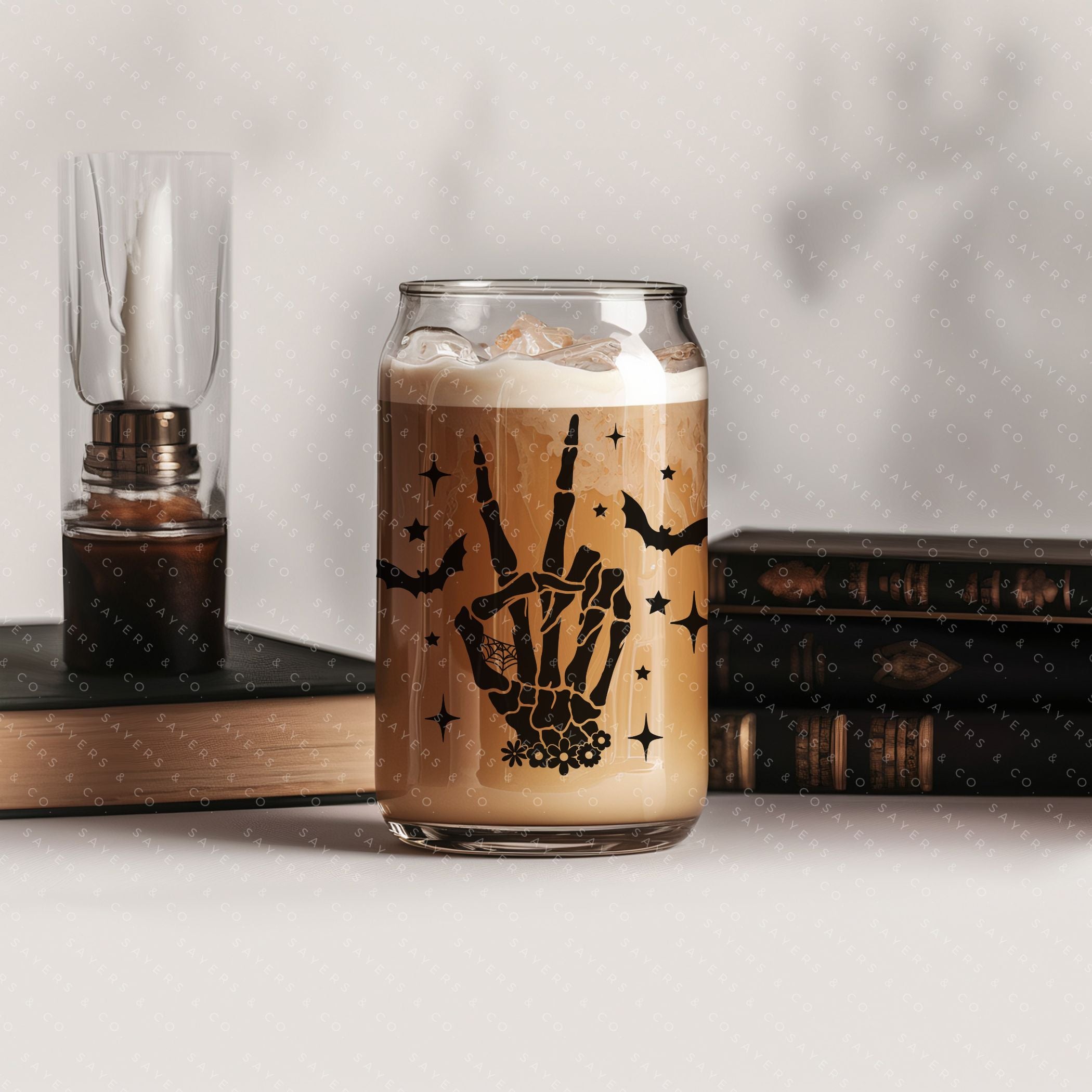 16oz Skeleton Peace Sign Glass Cup featuring a bamboo lid and straw, perfect for Halloween and everyday use.