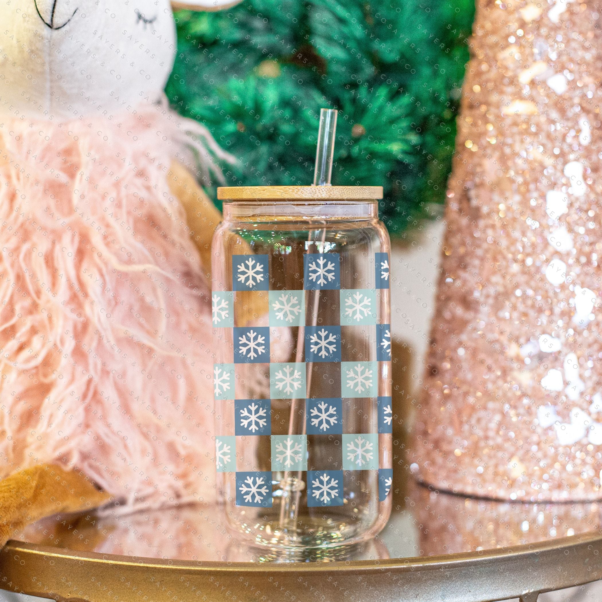 16oz Snowfall Glass Cup with Bamboo Lid and Straw, featuring a winter snowfall design, perfect for hot and cold beverages.