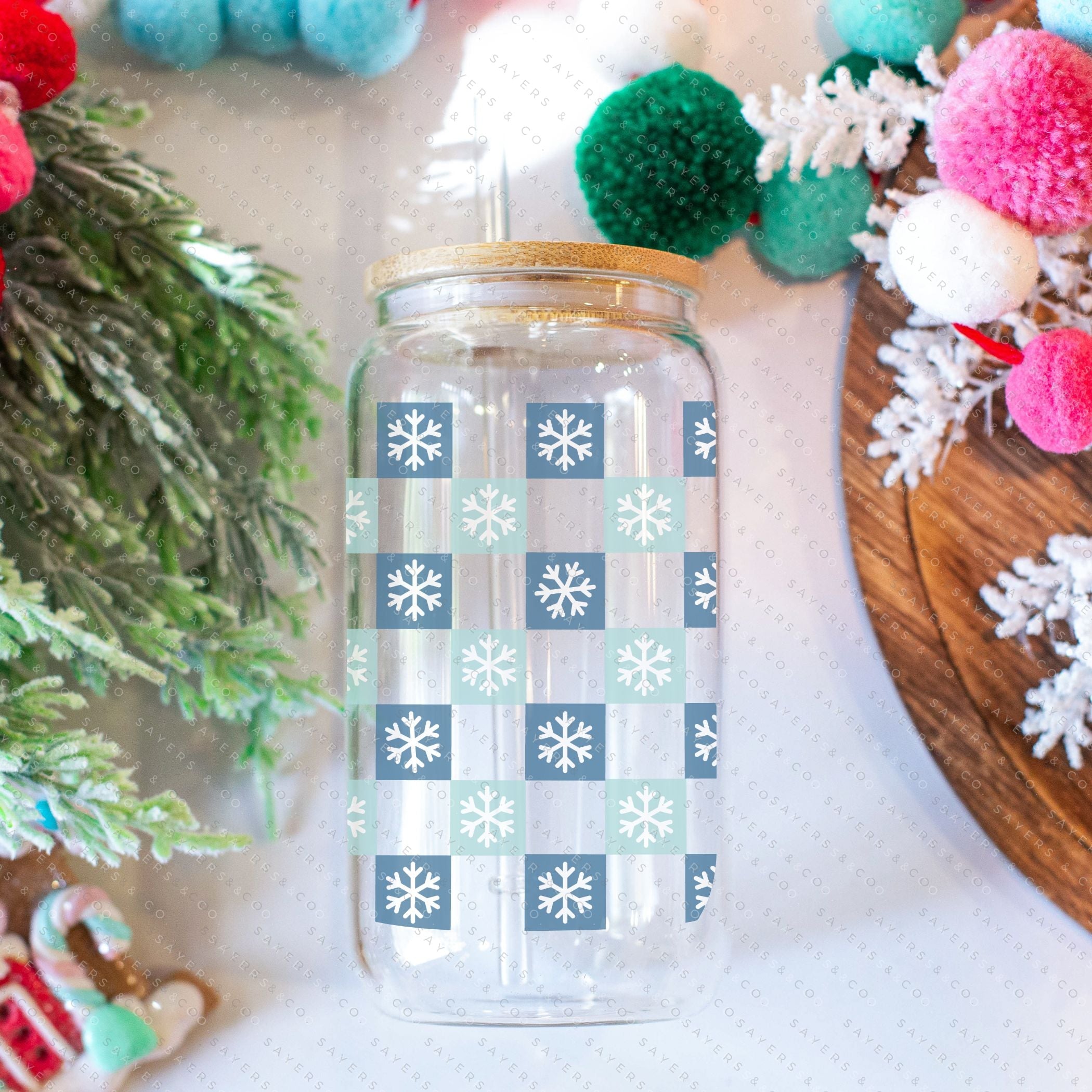 16oz Snowfall Glass Cup with Bamboo Lid and Straw, featuring a winter snowfall design, perfect for hot and cold beverages.