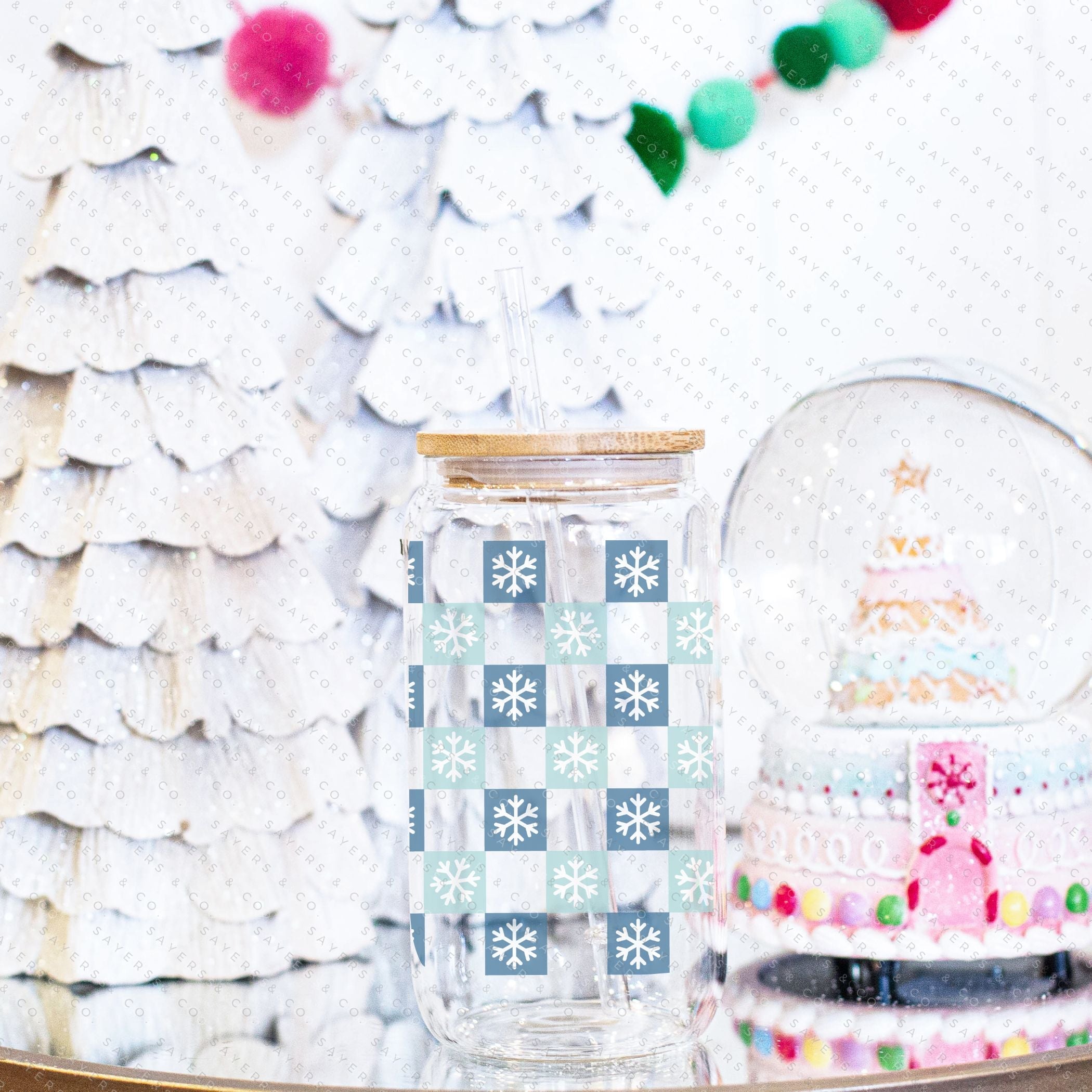 16oz Snowfall Glass Cup with Bamboo Lid and Straw, featuring a winter snowfall design, perfect for hot and cold beverages.