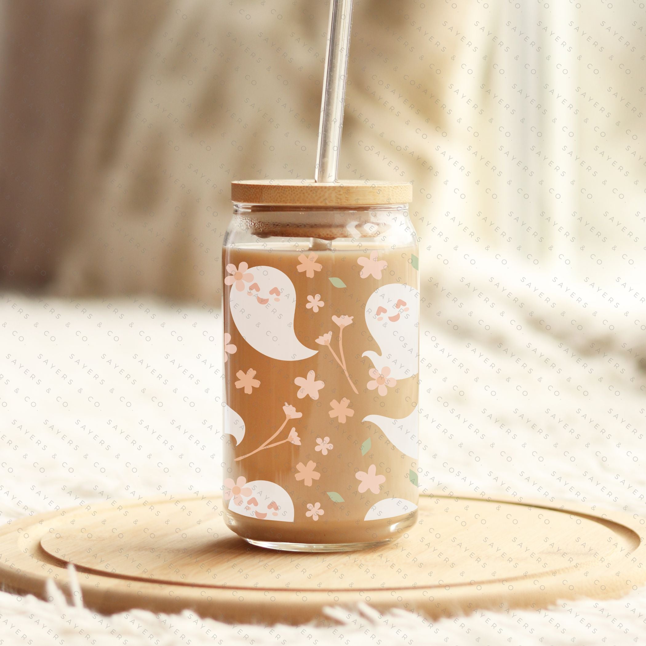 16oz Spring Ghosts Glass Cup with Bamboo Lid and Straw, featuring a whimsical spring design perfect for various beverages.