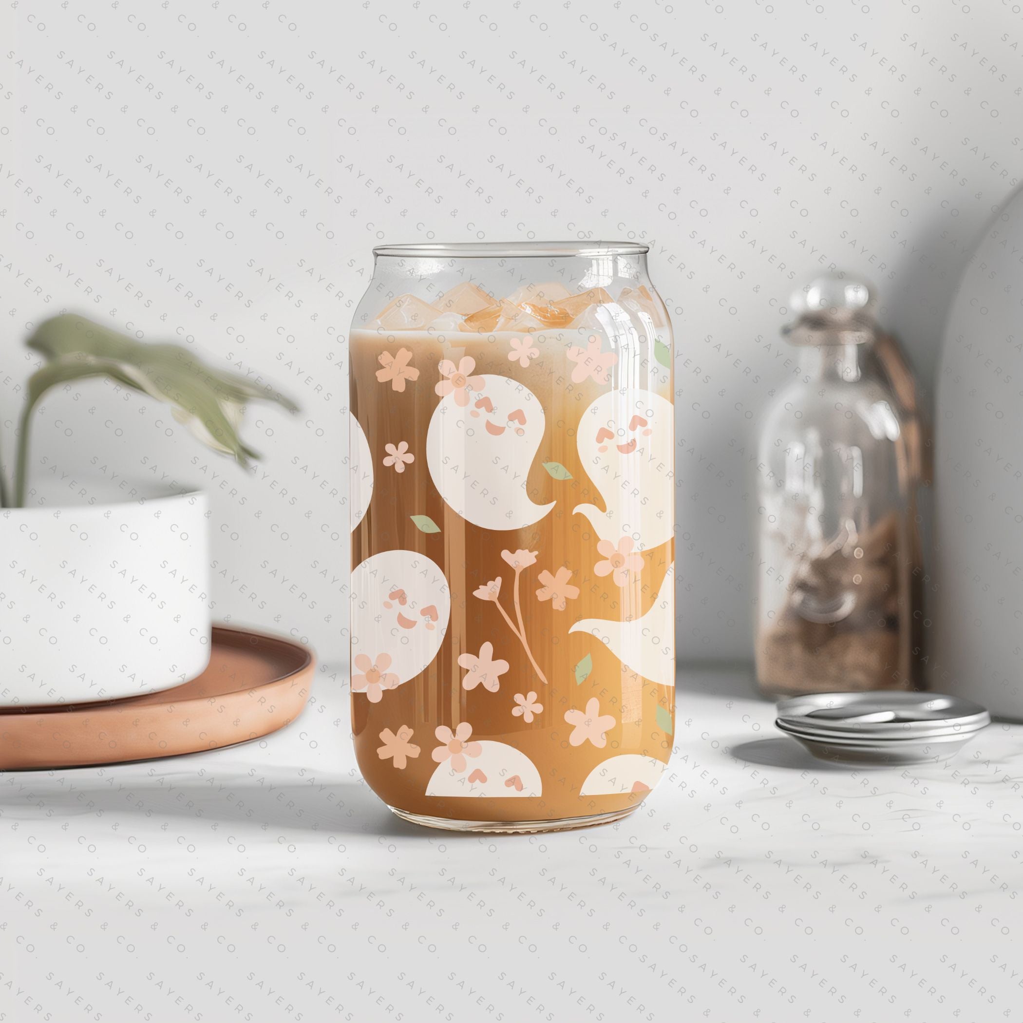16oz Spring Ghosts Glass Cup with Bamboo Lid and Straw, featuring a whimsical spring design perfect for various beverages.