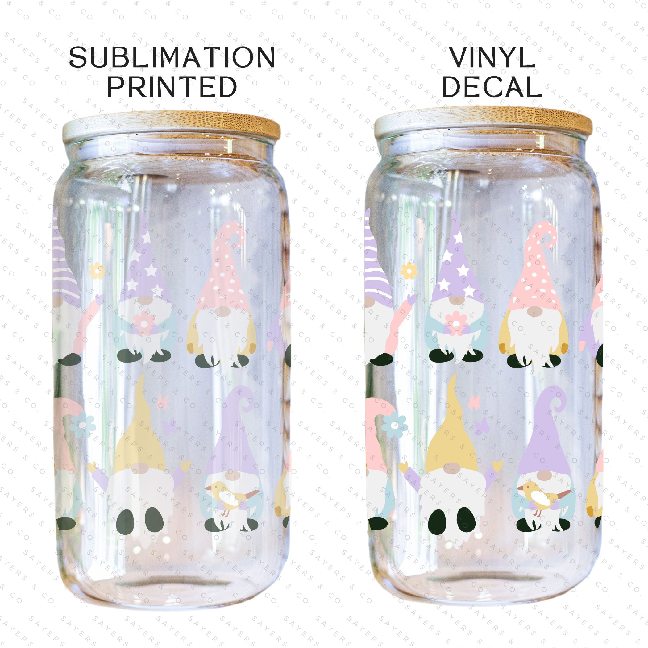 A 16oz clear glass cup featuring a whimsical spring gnome design, complete with a bamboo lid and a clear plastic straw, perfect for various beverages.