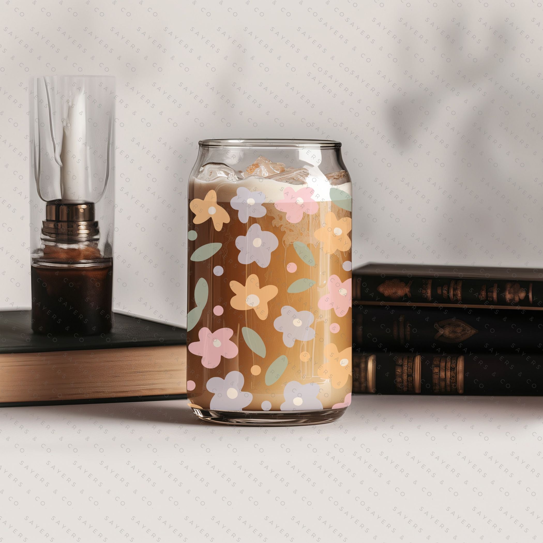 16oz Spring Pastel Petals Glass Cup featuring a bamboo lid and straw, adorned with colorful floral designs, perfect for beverages.