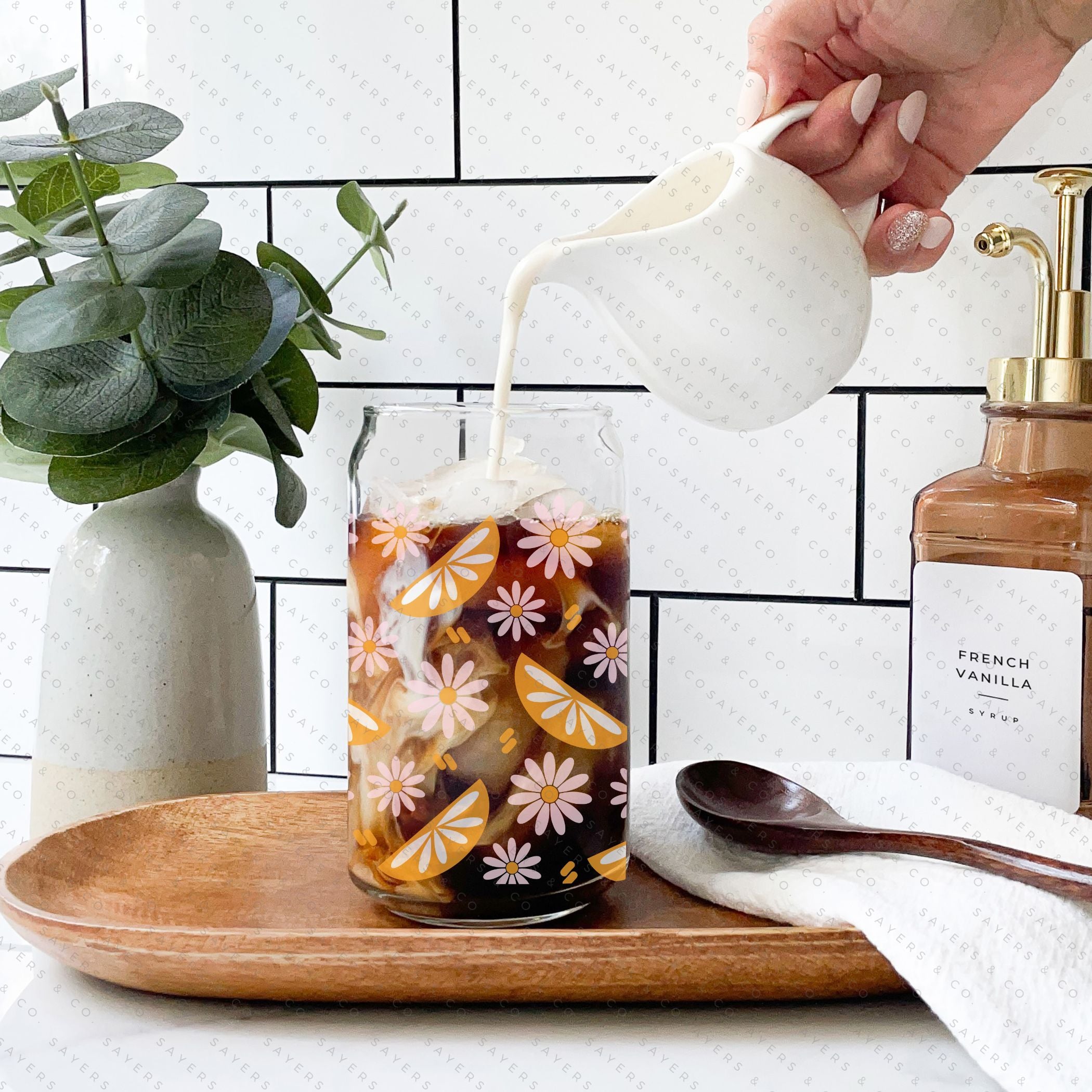 16oz Spring Squeeze The Day Glass Cup with bamboo lid and straw, showcasing a vibrant floral design perfect for spring.