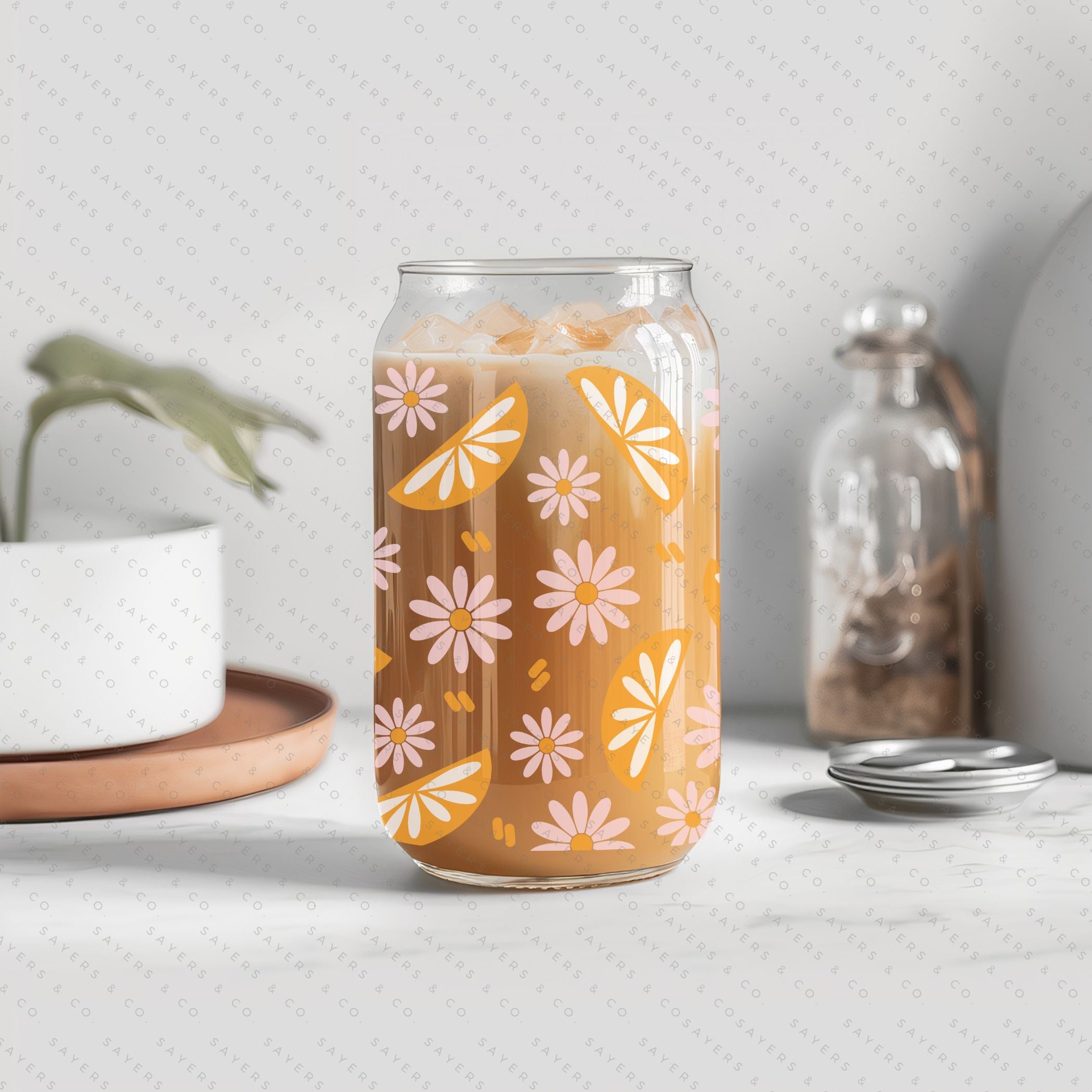 16oz Spring Squeeze The Day Glass Cup with bamboo lid and straw, showcasing a vibrant floral design perfect for spring.