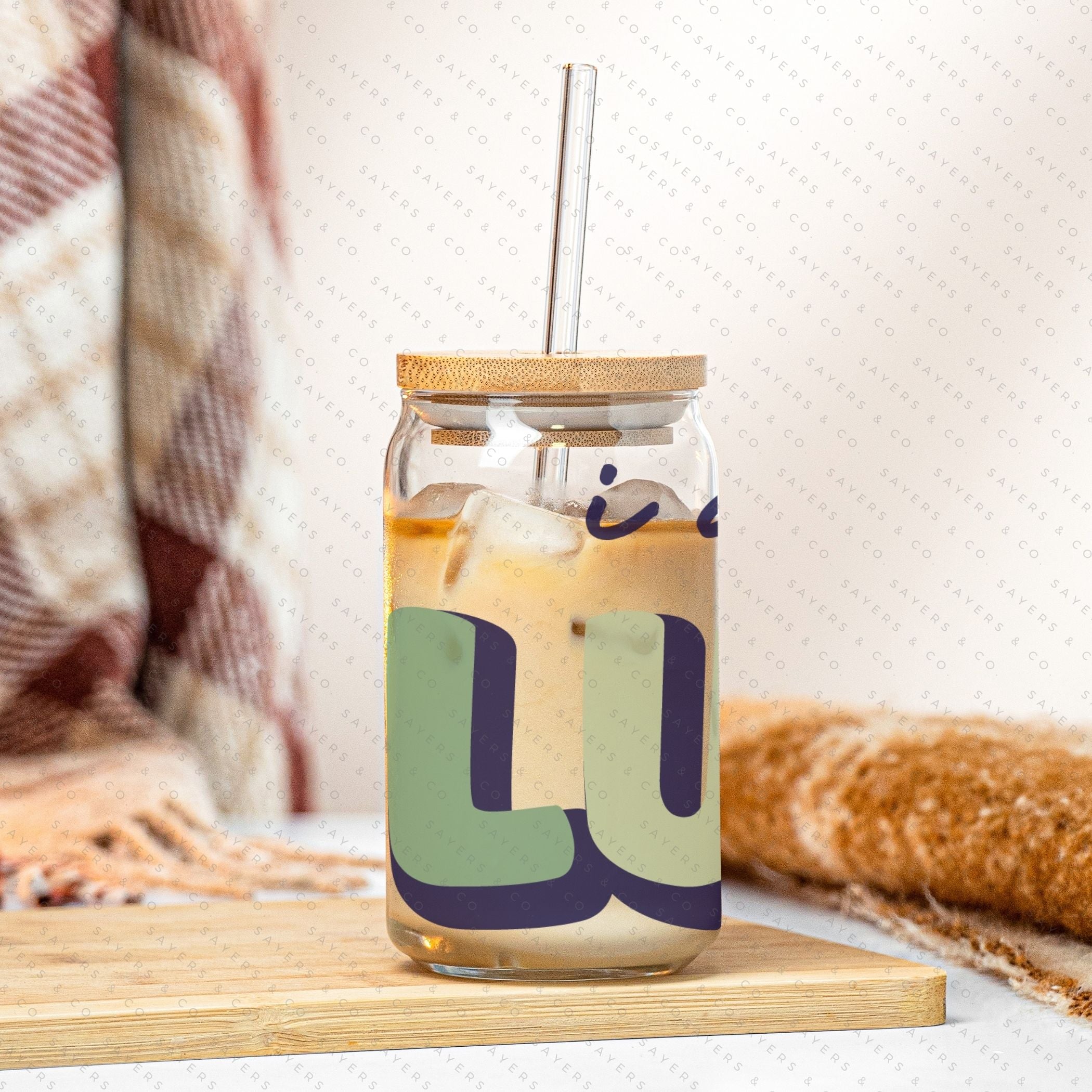 16oz St. Patrick's Day glass cup with bamboo lid and straw, featuring a fun 'I Am So Lucky' design, perfect for festive drinks.