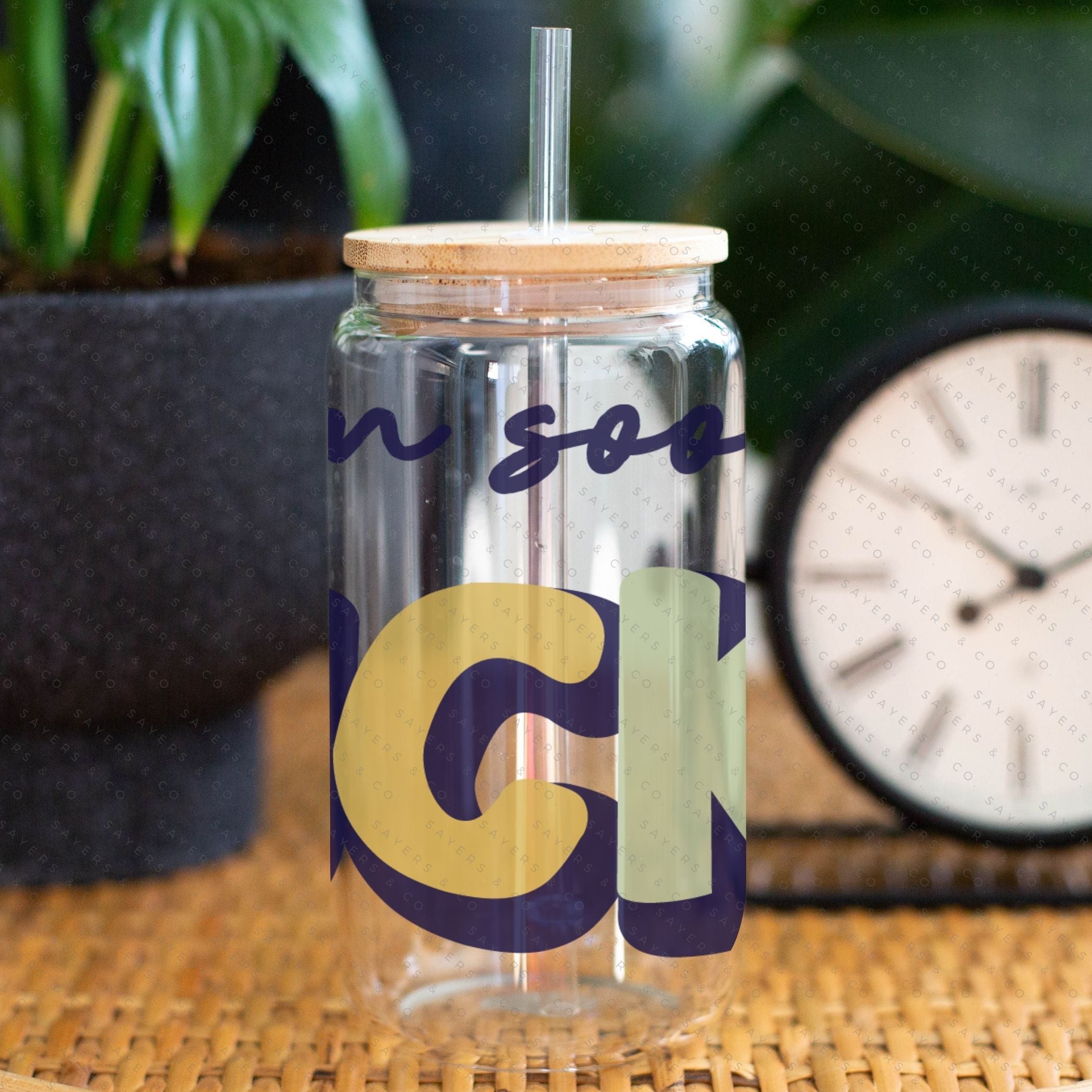 16oz St. Patrick's Day glass cup with bamboo lid and straw, featuring a fun 'I Am So Lucky' design, perfect for festive drinks.