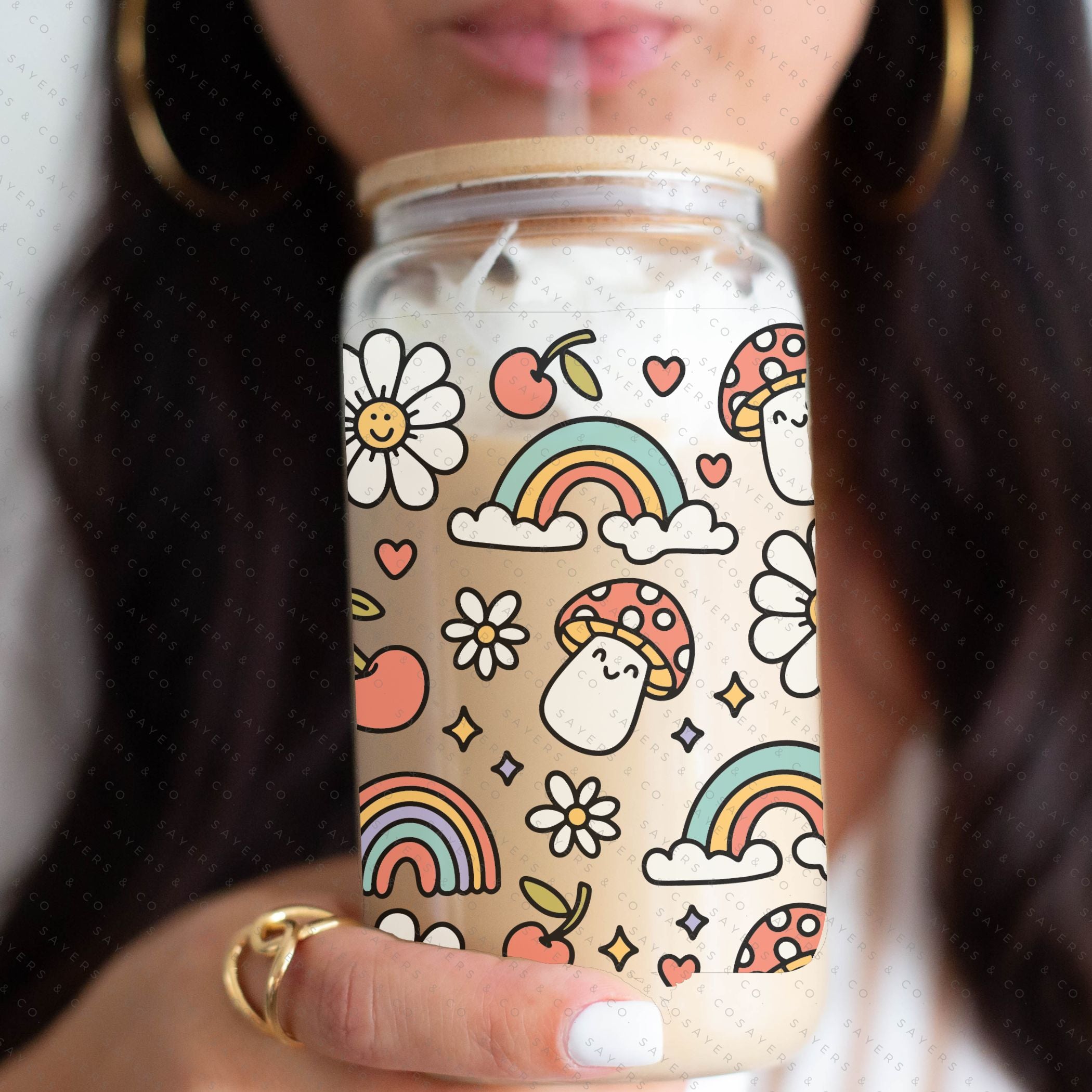 16oz Summer Groovy Glass Cup with Bamboo Lid and Straw, showcasing a colorful design perfect for summer drinks.