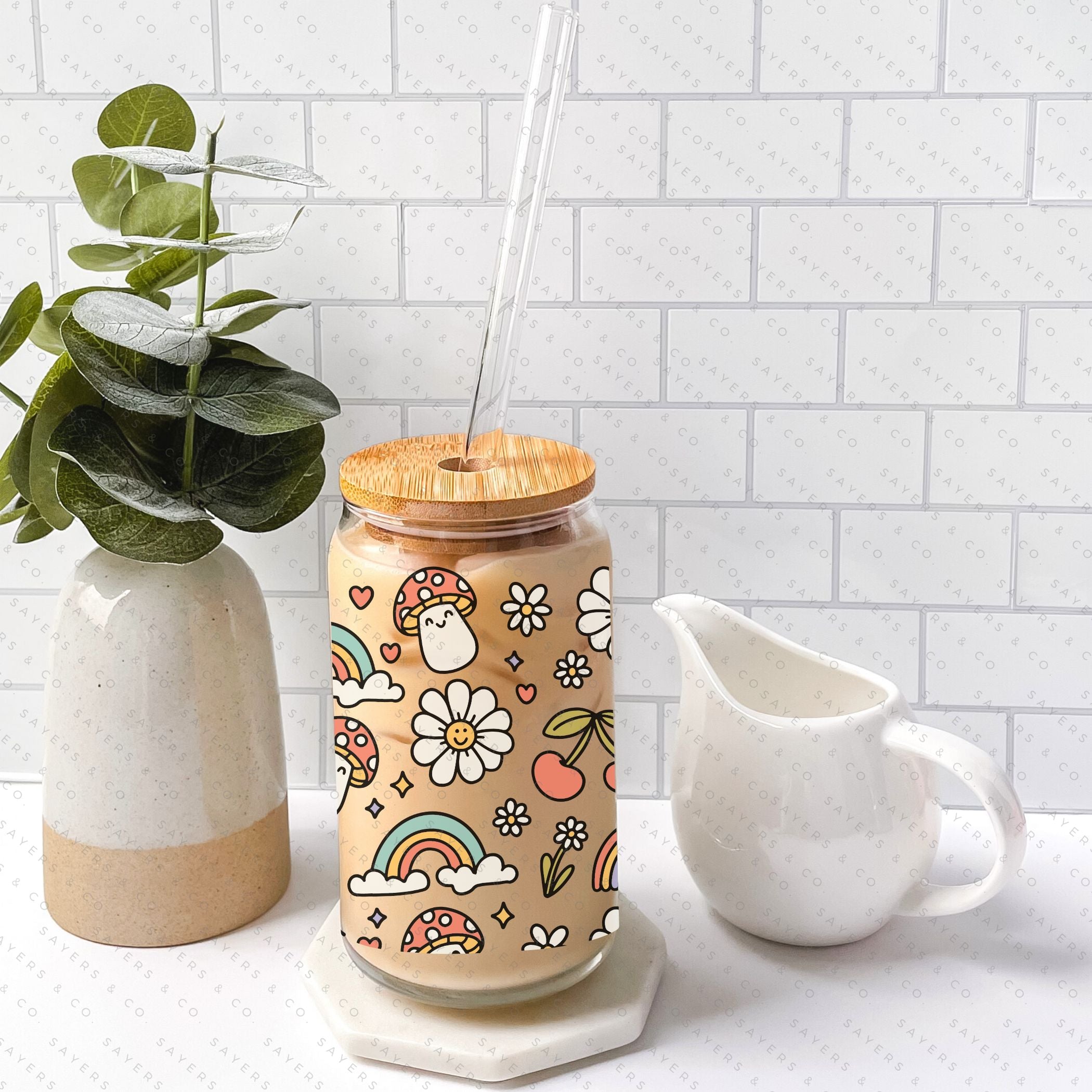 16oz Summer Groovy Glass Cup with Bamboo Lid and Straw, showcasing a colorful design perfect for summer drinks.