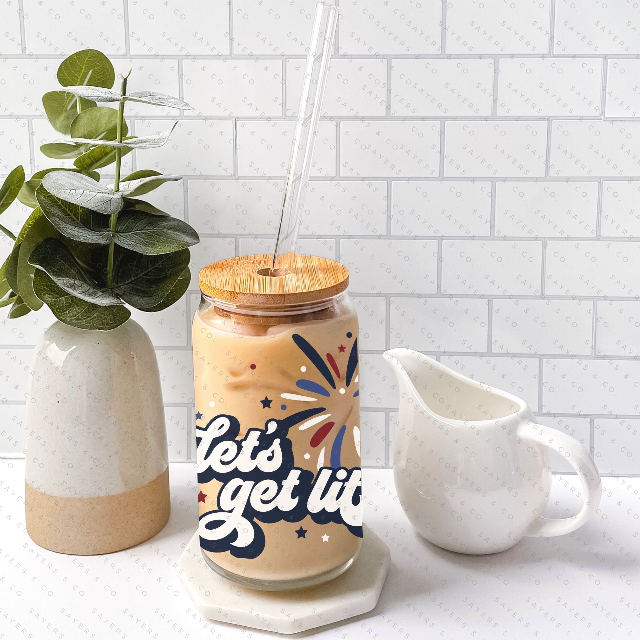 16oz Summer Let's Get Lit Patriotic Glass Cup featuring a bamboo lid and straw, perfect for summer drinks.