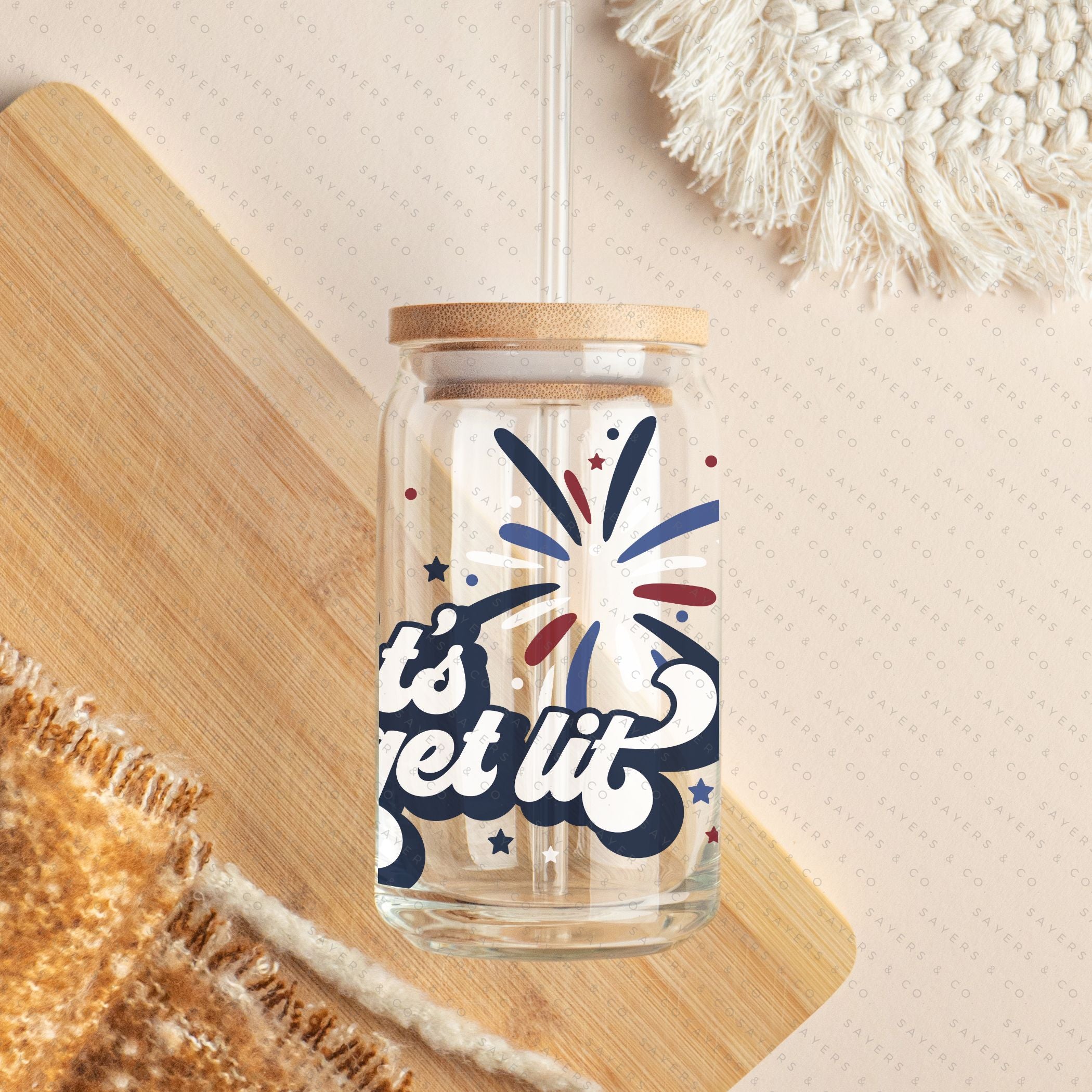 16oz Summer Let's Get Lit Patriotic Glass Cup featuring a bamboo lid and straw, perfect for summer drinks.