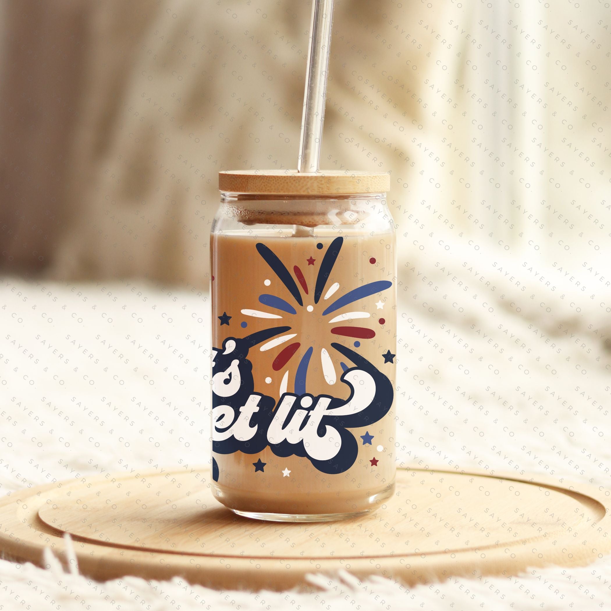 16oz Summer Let's Get Lit Patriotic Glass Cup featuring a bamboo lid and straw, perfect for summer drinks.