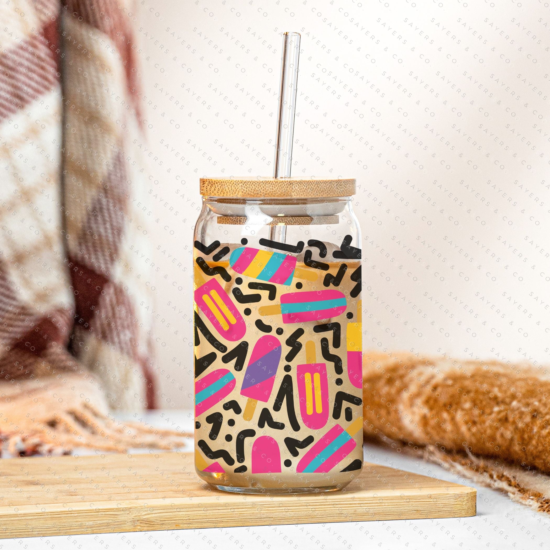 16oz Summer Popsicle Party Glass Cup with Bamboo Lid and Straw, featuring colorful designs perfect for summer drinks.