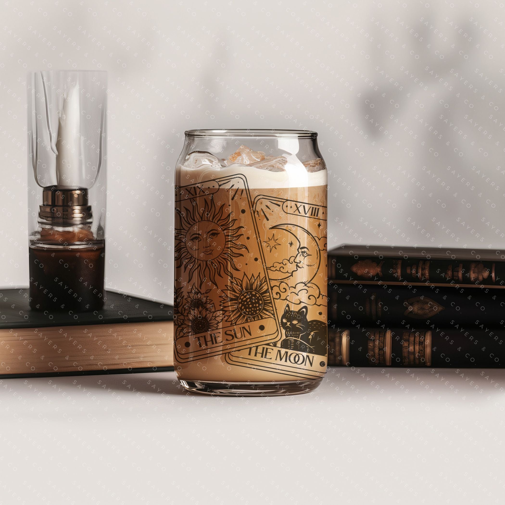16oz Tarot Cards Sun and Moon Glass Cup featuring a bamboo lid and straw, perfect for various beverages.