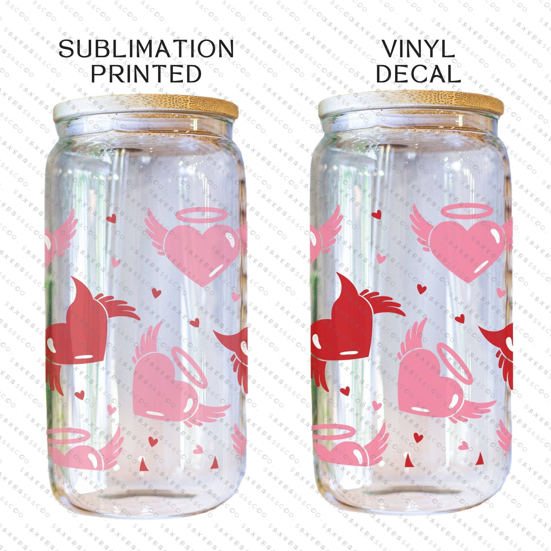 16oz Valentine's Day glass cup featuring angel and devil hearts design, with bamboo lid and clear straw, perfect for beverages.