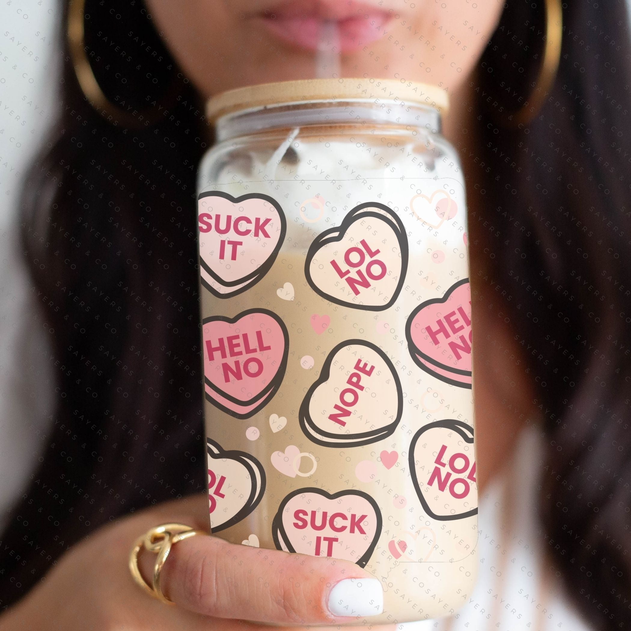 16oz Valentine's Day Candy Hearts Glass Cup with bamboo lid and straw, featuring a colorful heart design, perfect for drinks.