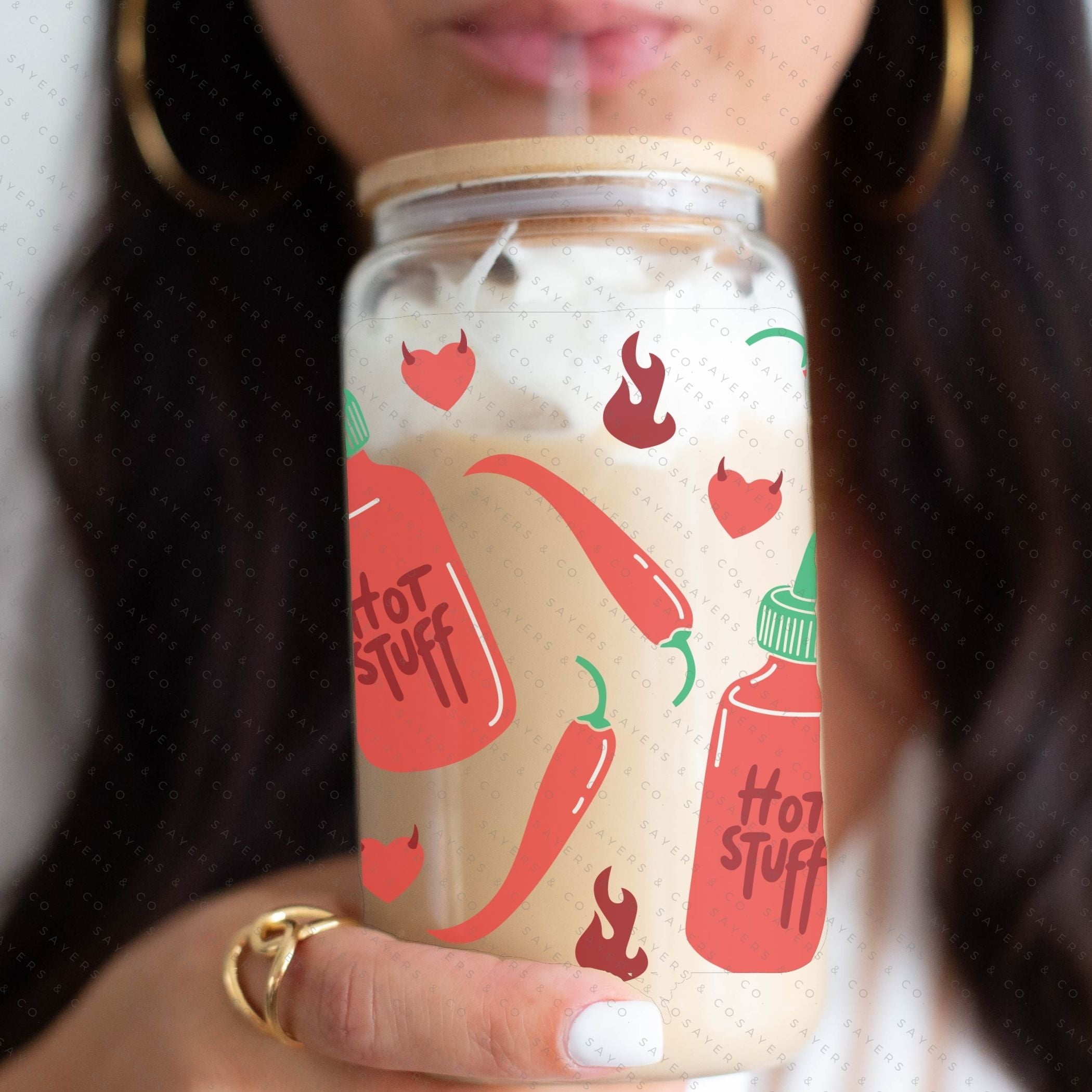 16oz Valentine's Day Spicy Glass Cup featuring a bamboo lid and clear straw, perfect for stylish beverage enjoyment.