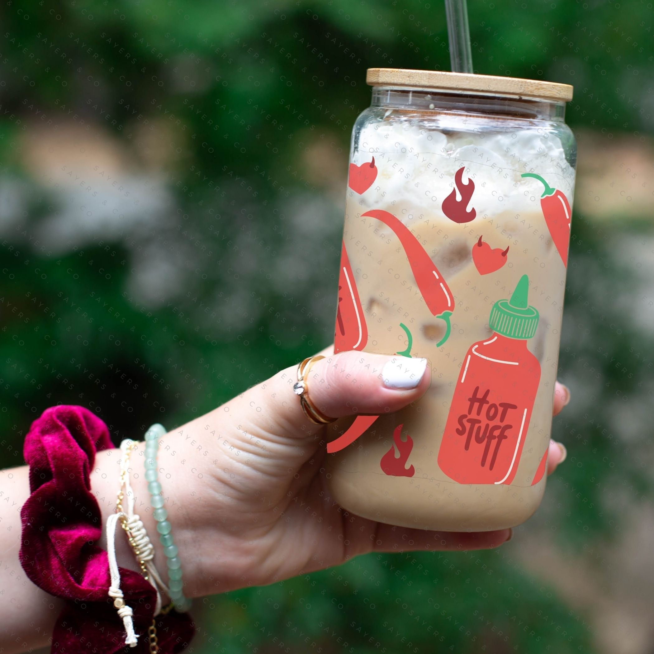 16oz Valentine's Day Spicy Glass Cup featuring a bamboo lid and clear straw, perfect for stylish beverage enjoyment.