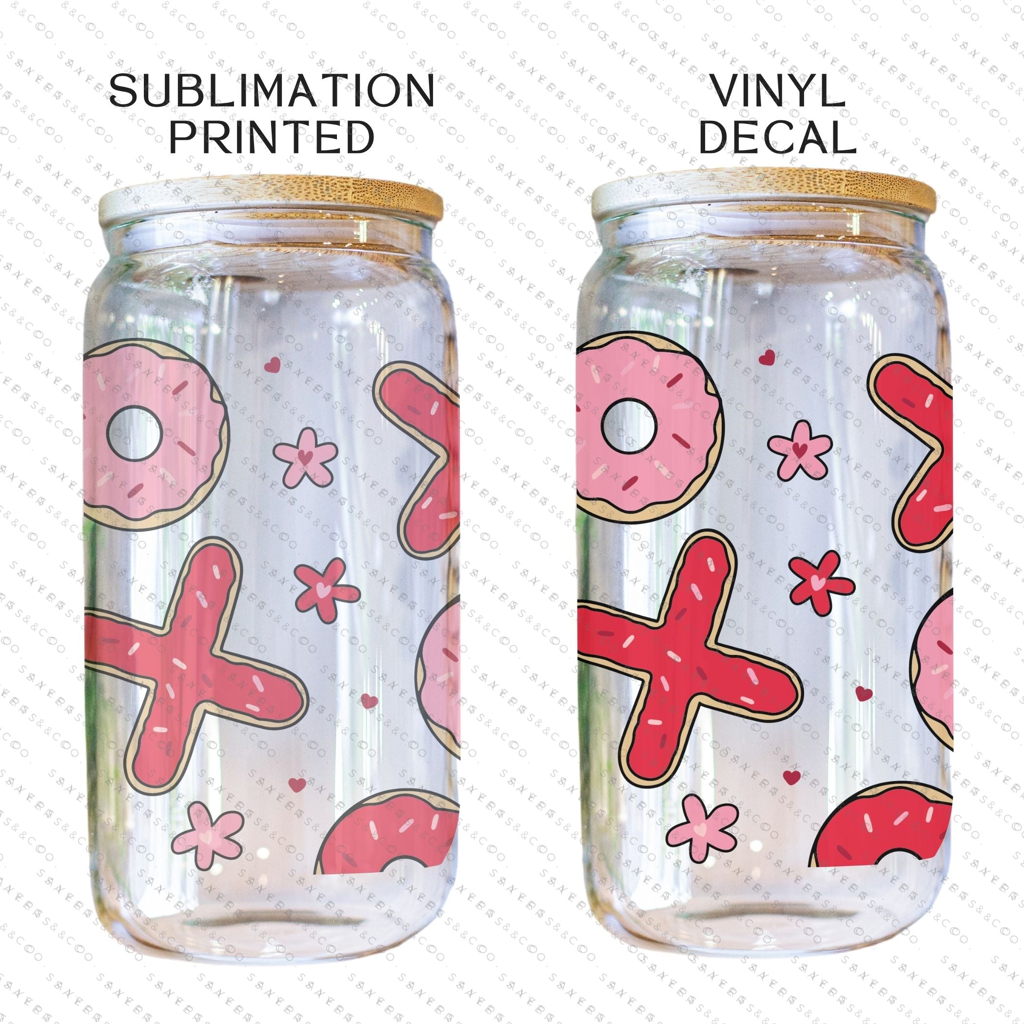 16oz Valentine's Day Xs and Os Donut Glass Cup featuring a bamboo lid and straw, perfect for drinks.