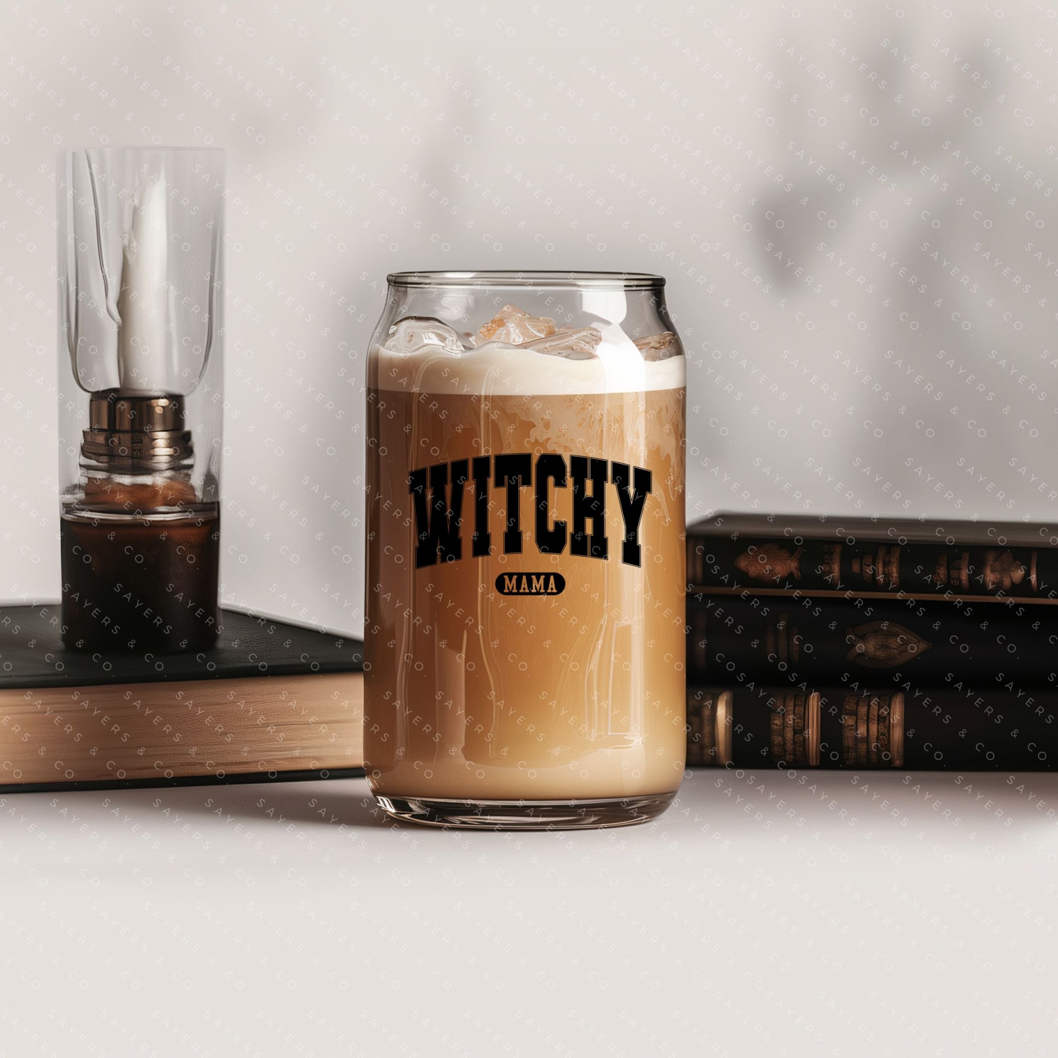 16oz Witchy Mama Glass Cup with bamboo lid and straw, featuring a whimsical design perfect for Halloween and everyday use.