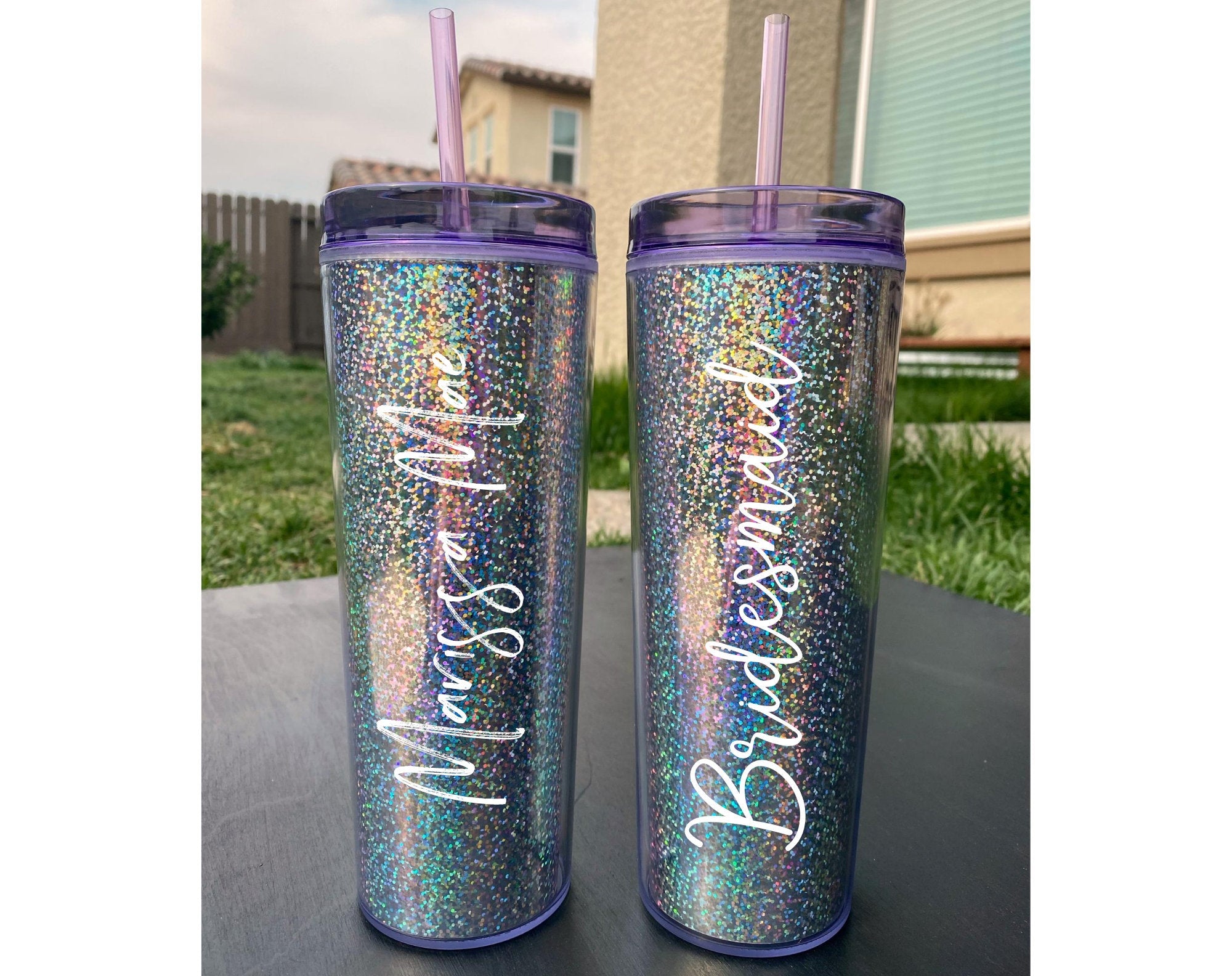20 oz Blank Holographic Glitter Acrylic Tumbler with purple lid and straw, showcasing a sparkling glitter finish.