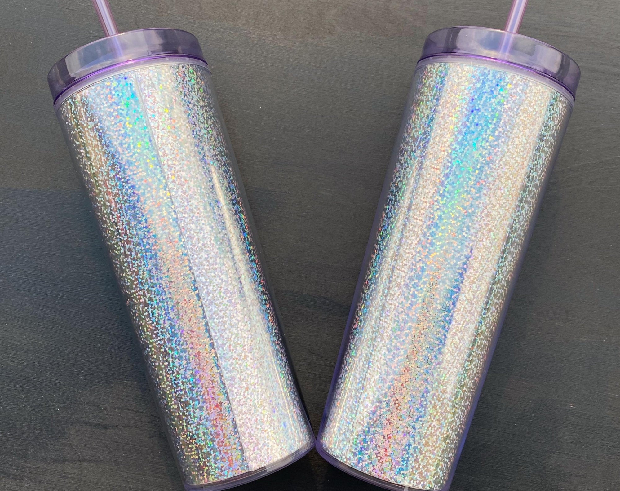 20 oz Blank Holographic Glitter Acrylic Tumbler with purple lid and straw, showcasing a sparkling glitter finish.