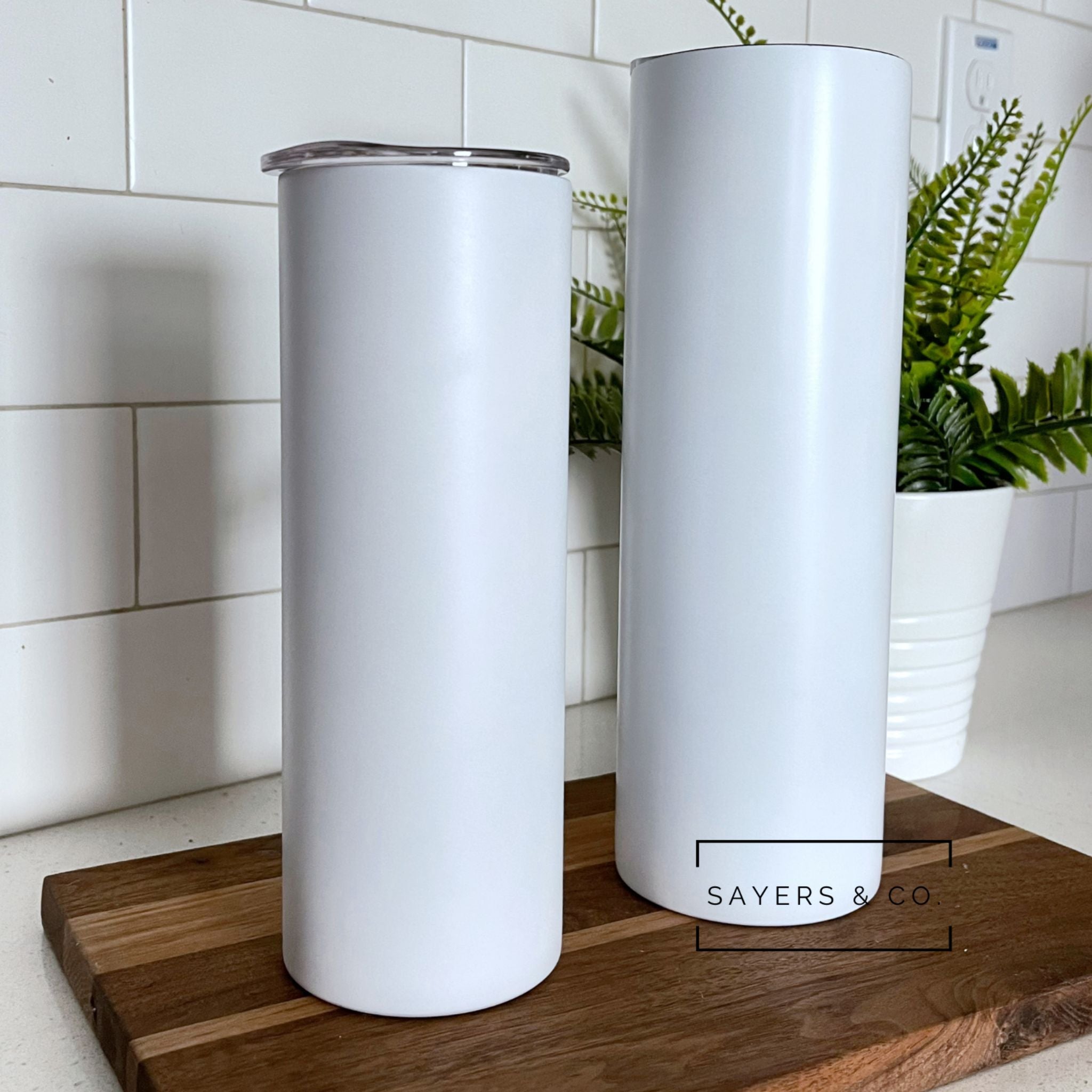 20oz and 30oz Straight Matte White Sublimation Skinny Tumblers with straw and rubber bottom, ideal for personalization.