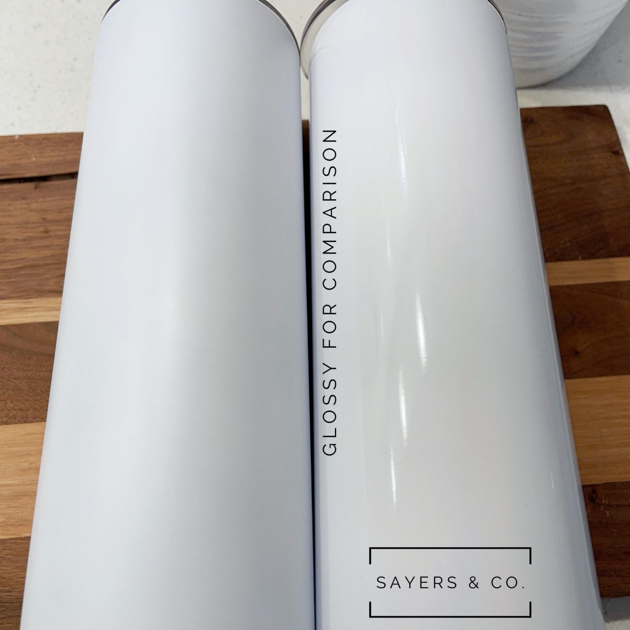 20oz Matte White Sublimation Skinny Tumbler with straw and non-slip bottom, perfect for custom designs.