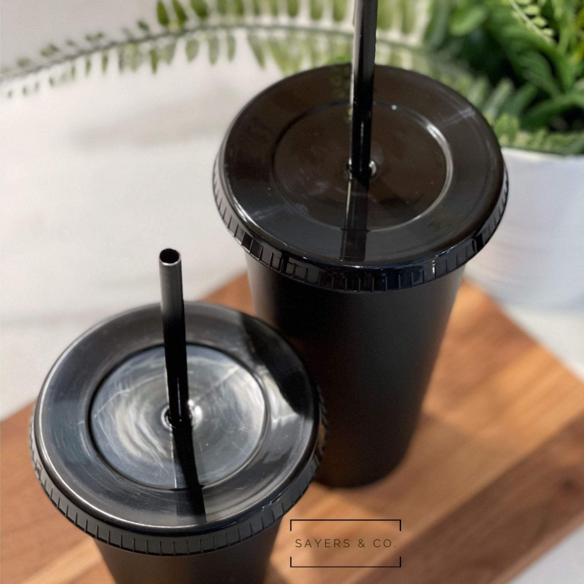 24oz Matte Glitter Cold Cup in aqua, pink, and blue glitter options, alongside a matte black version, with matching straw and lid.