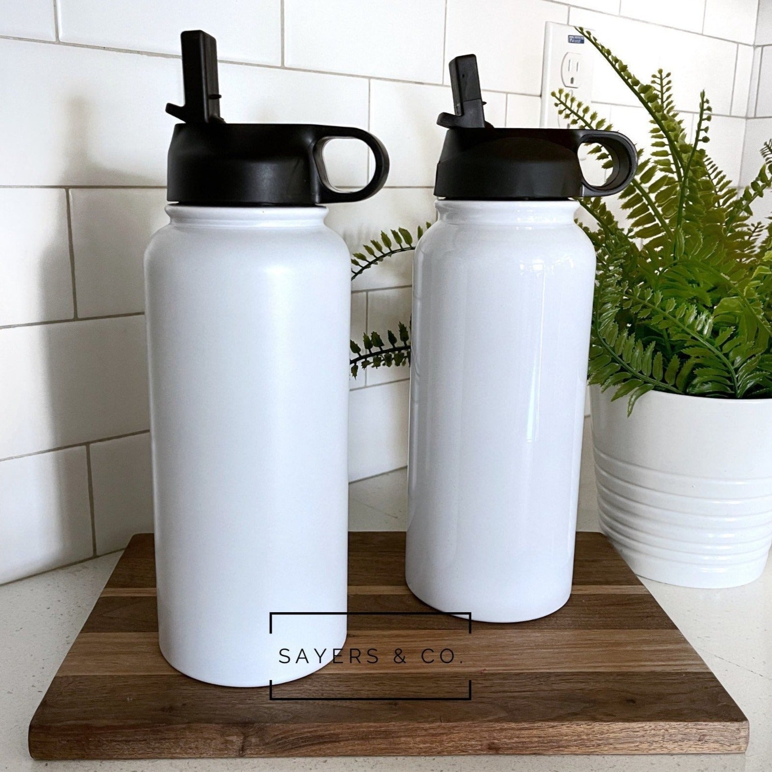 32oz and 18oz white sublimation sport bottle tumblers made of stainless steel, ideal for custom designs.