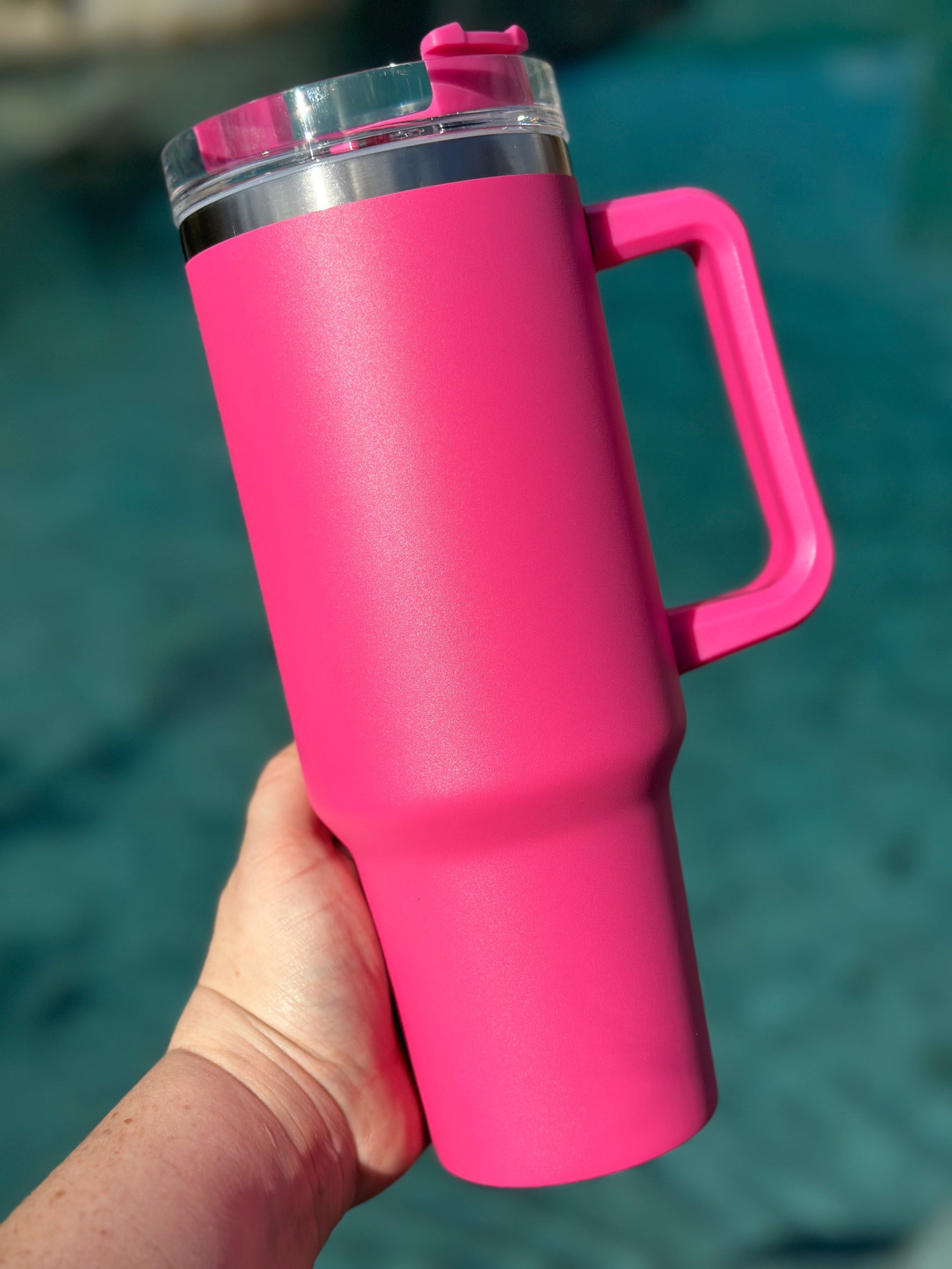 40 oz double walled insulated tumbler in various colors with a screw top lid and straw, perfect for customization.
