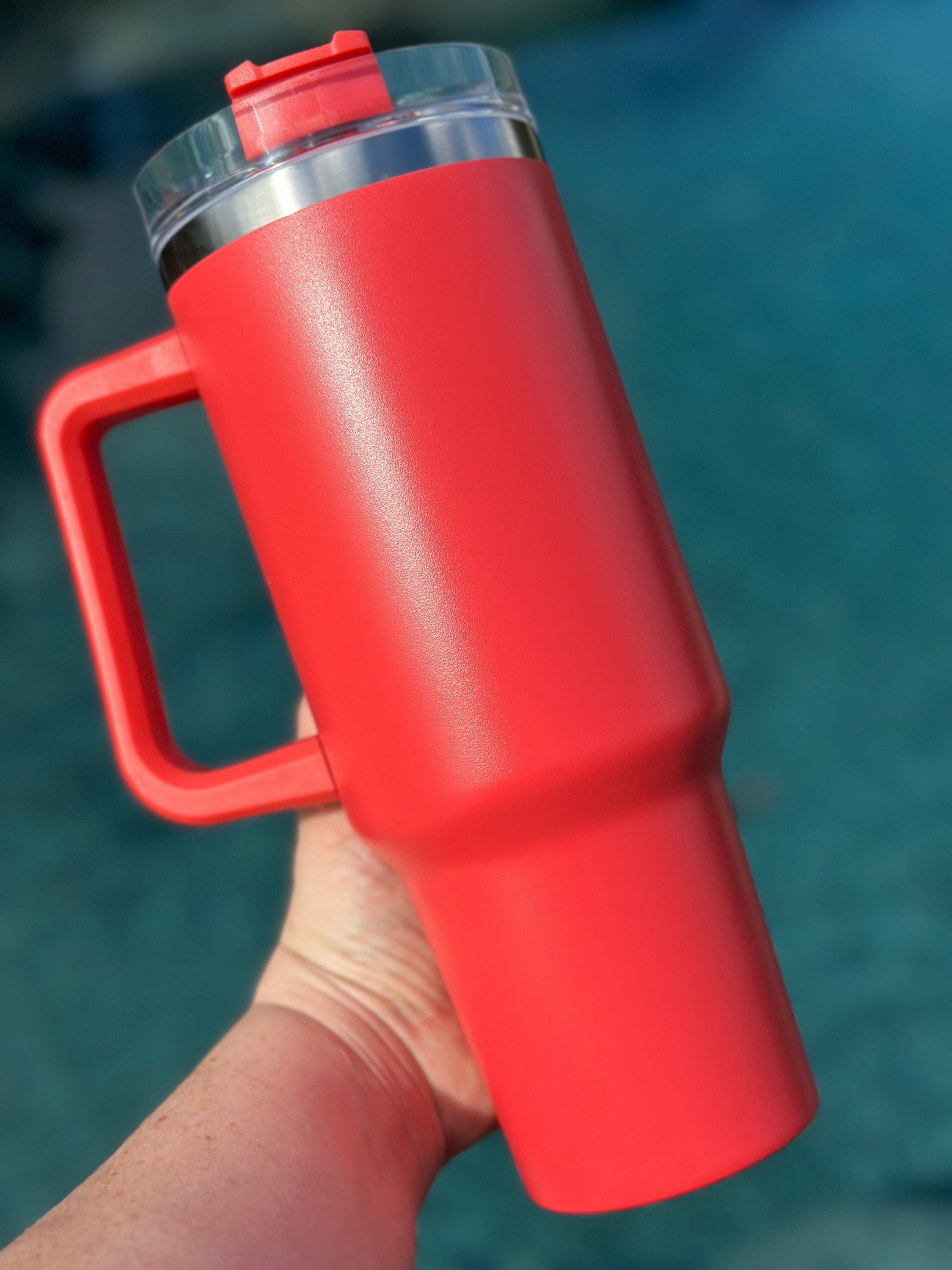 40 oz double walled insulated tumbler in various colors with a screw top lid and straw, perfect for customization.