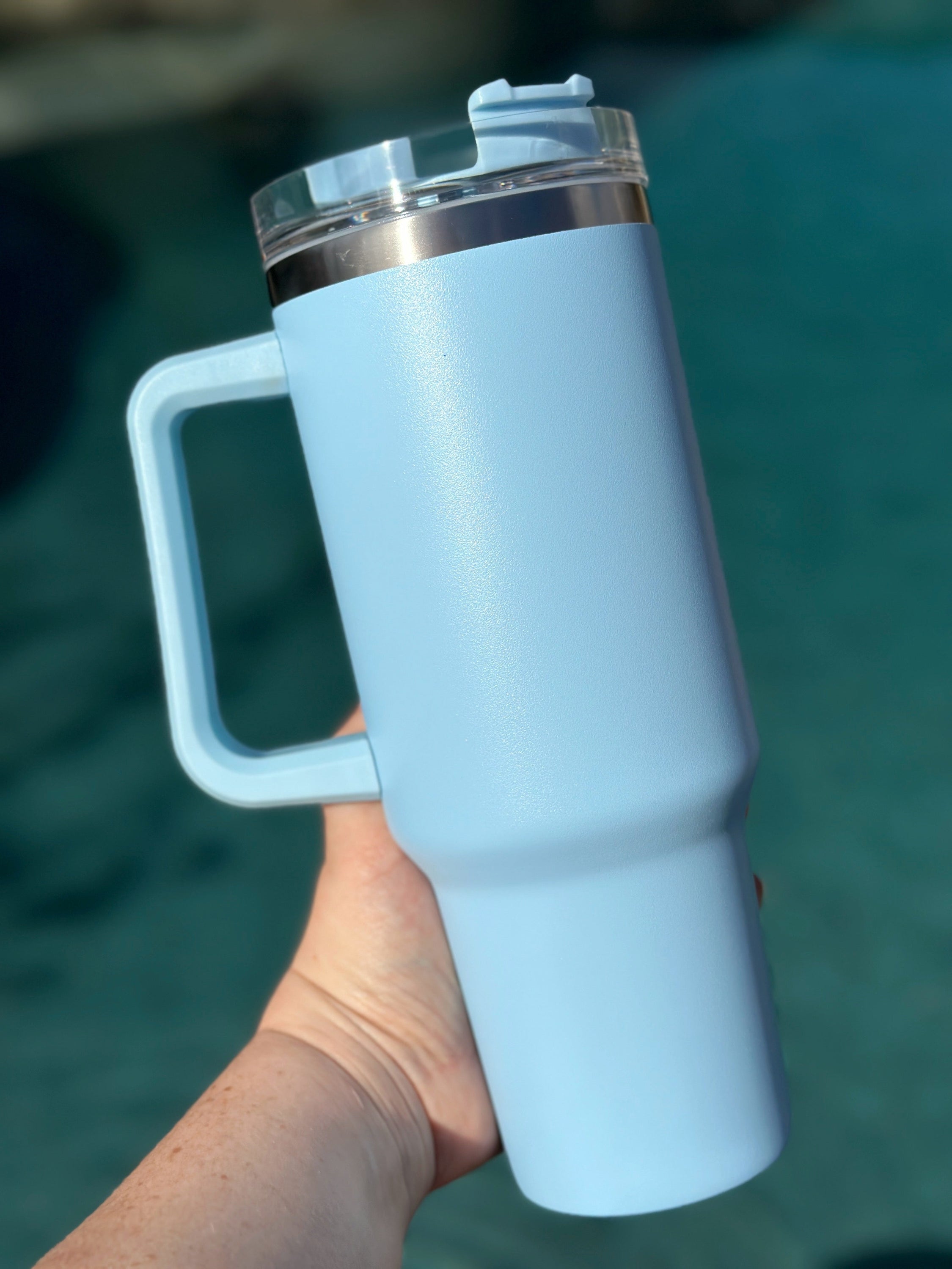 40 oz double walled insulated tumbler in various colors with a screw top lid and straw, perfect for customization.