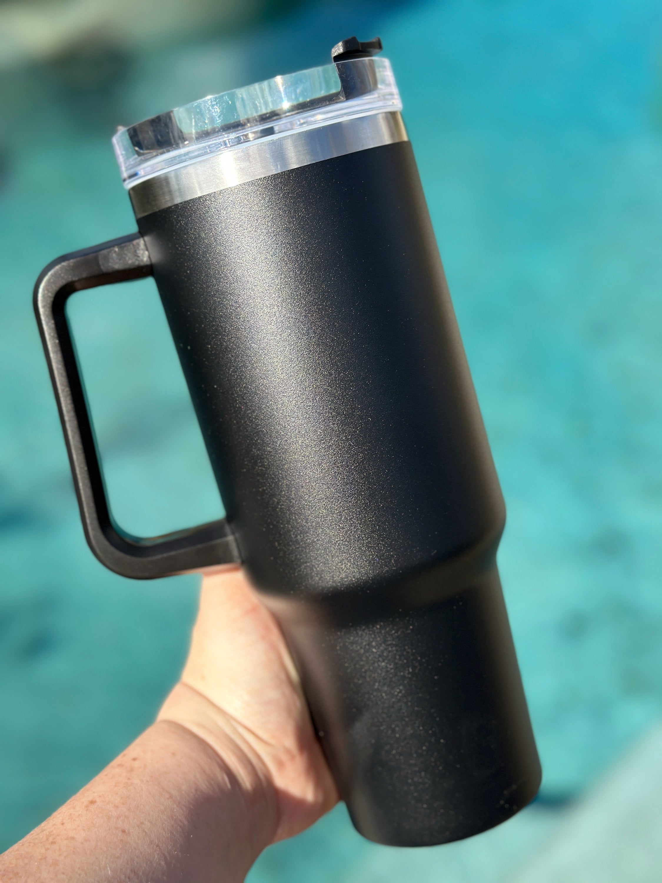 40 oz double walled insulated tumbler in various colors with a screw top lid and straw, perfect for customization.