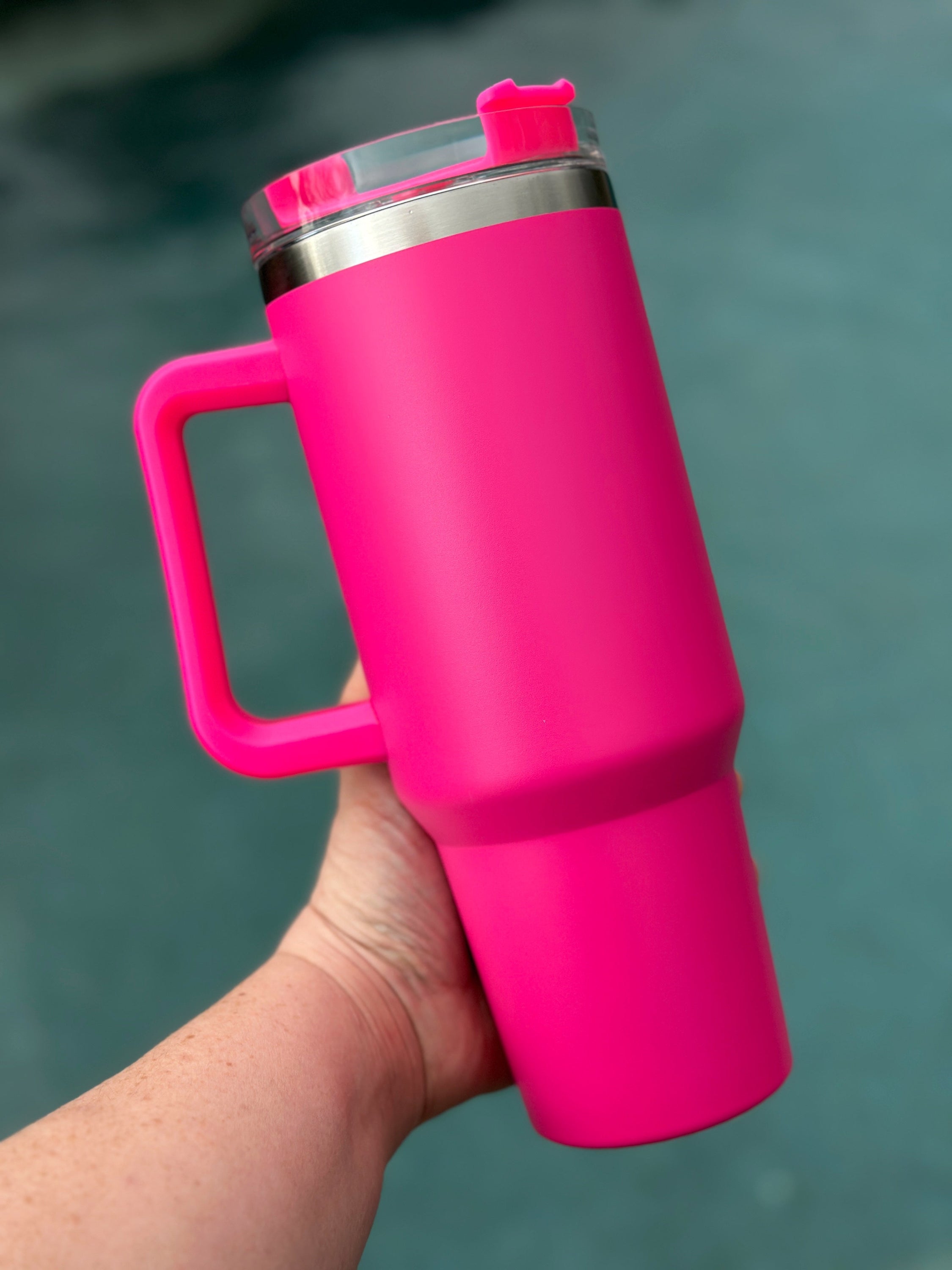 40 oz double walled insulated tumbler in various colors with a screw top lid and straw, perfect for customization.