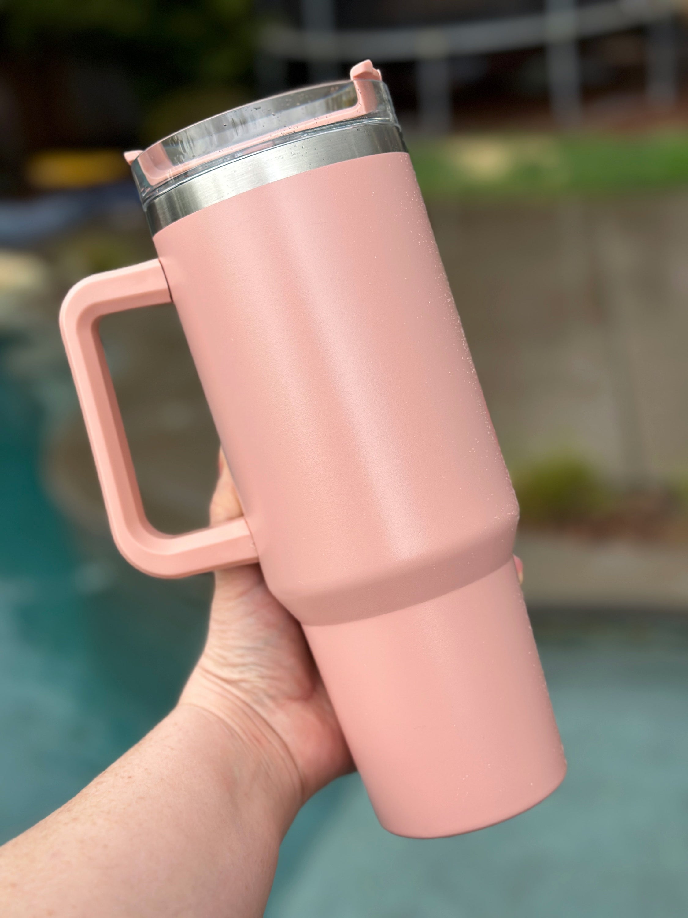 40 oz double walled insulated tumbler in various colors with a screw top lid and straw, perfect for customization.