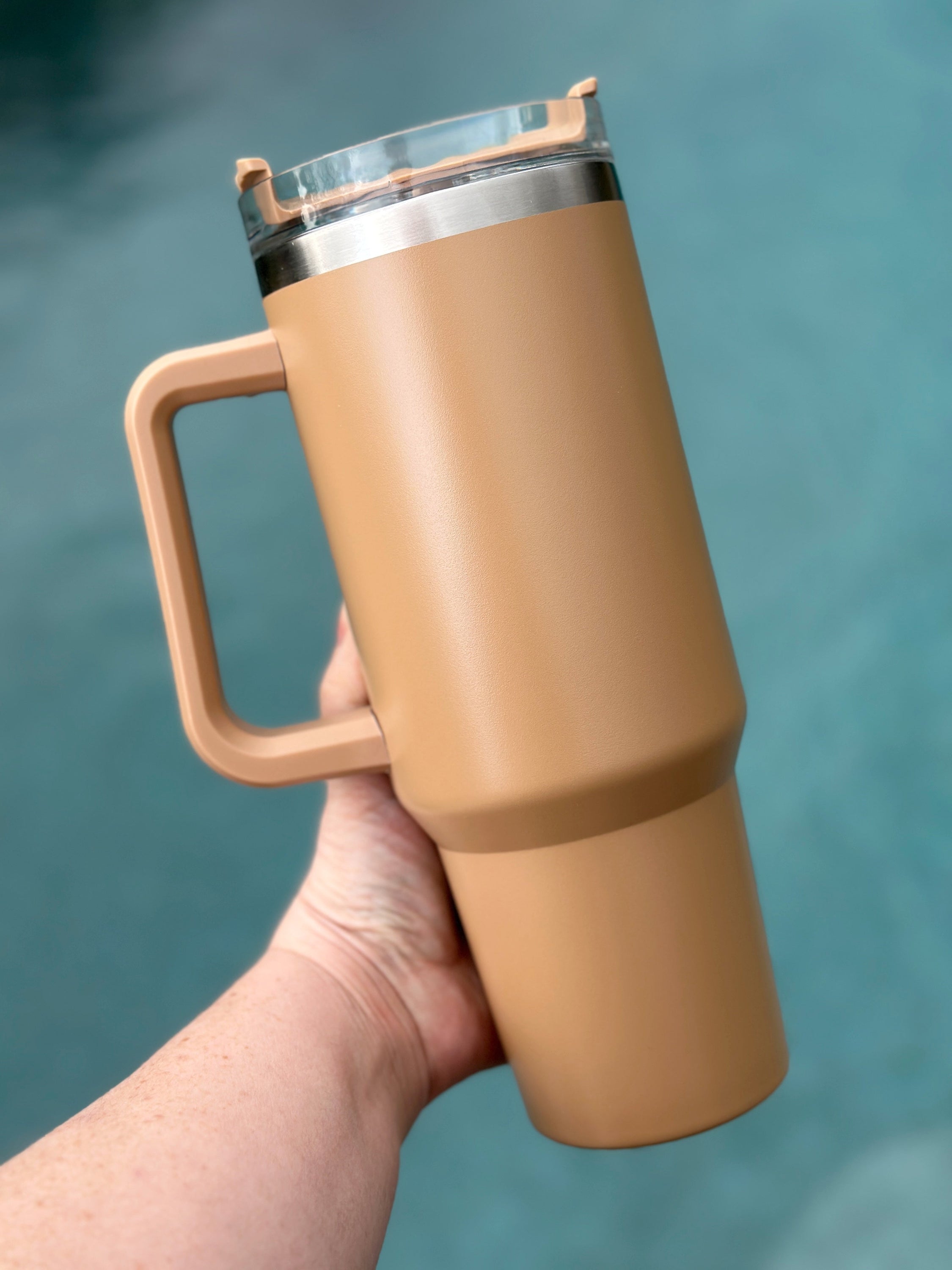 40 oz double walled insulated tumbler in various colors with a screw top lid and straw, perfect for customization.