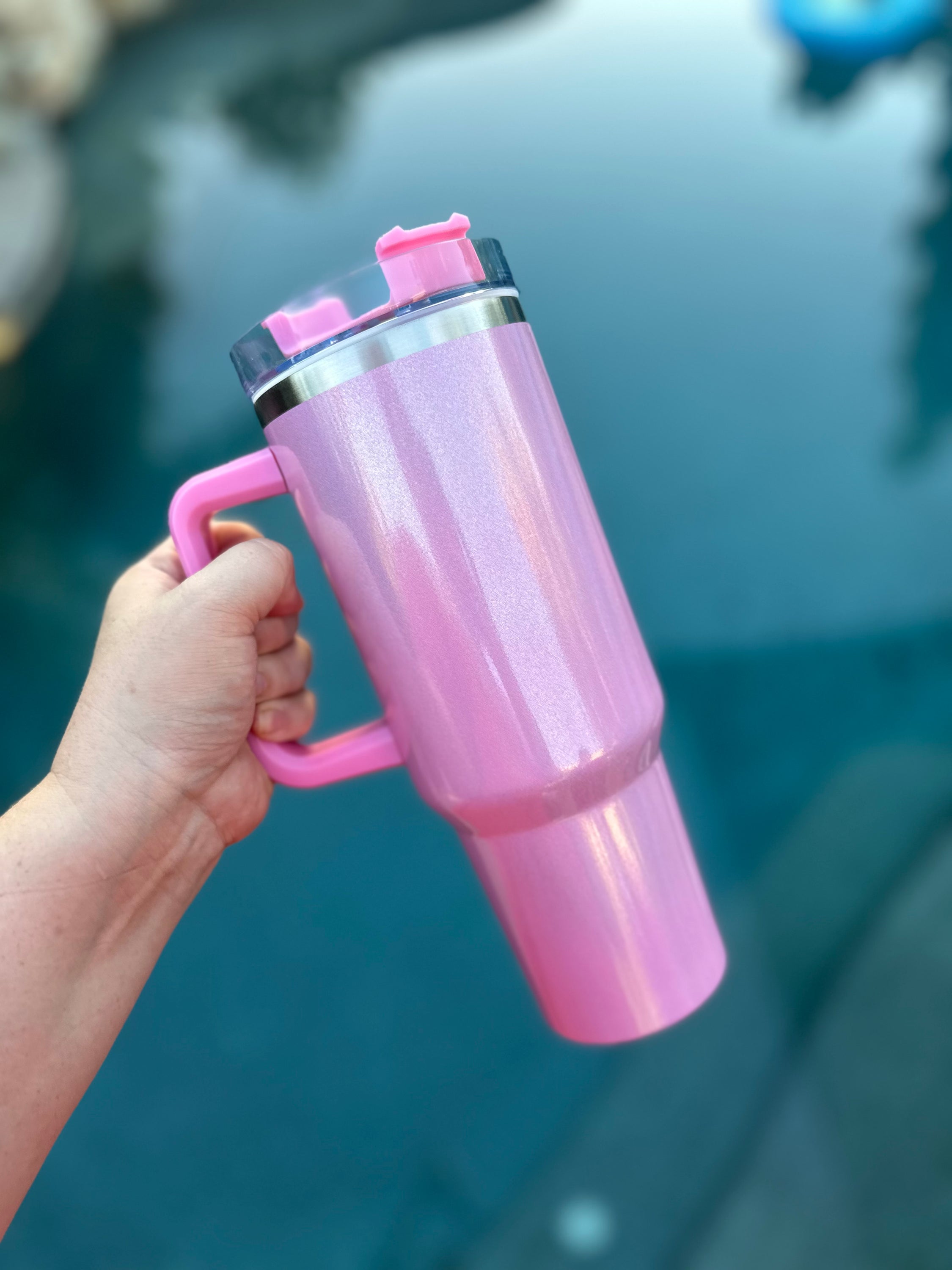 40 oz Holographic Glitter Sublimation Double Walled Tumbler with screw top and straw, showcasing a vibrant glitter finish.