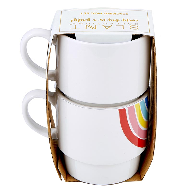 A colorful set of two stackable ceramic mugs featuring a vibrant 70s rainbow design, perfect for cozy beverages.