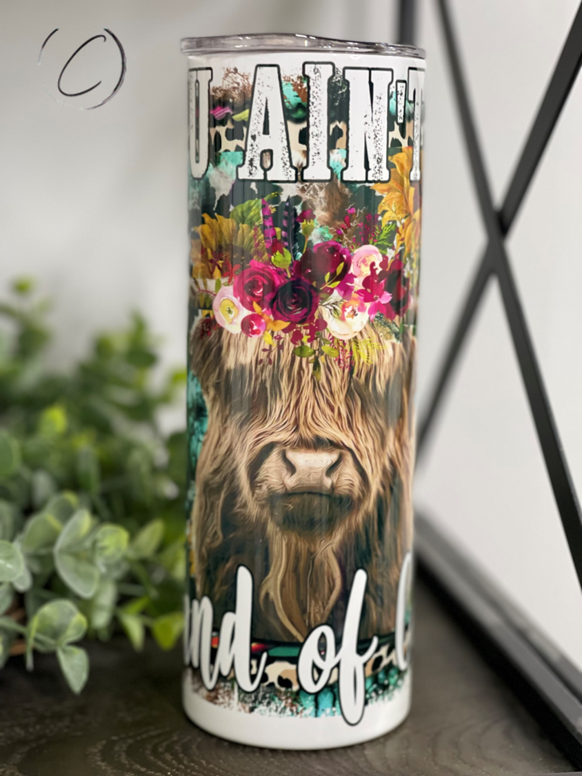 Ain't My Brand Of Cattle 20oz Skinny Tumbler featuring a stylish design, reusable straw, and durable construction.