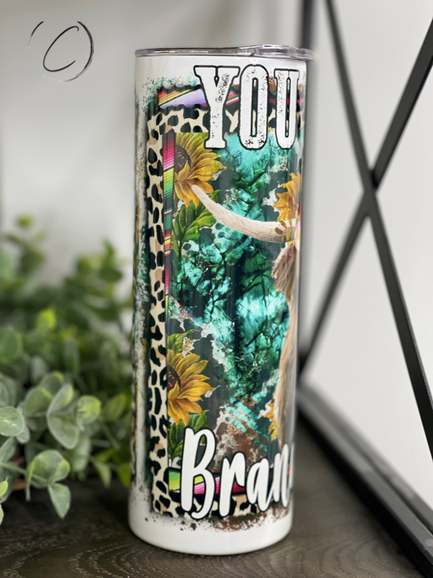 Ain't My Brand Of Cattle 20oz Skinny Tumbler featuring a stylish design, reusable straw, and durable construction.