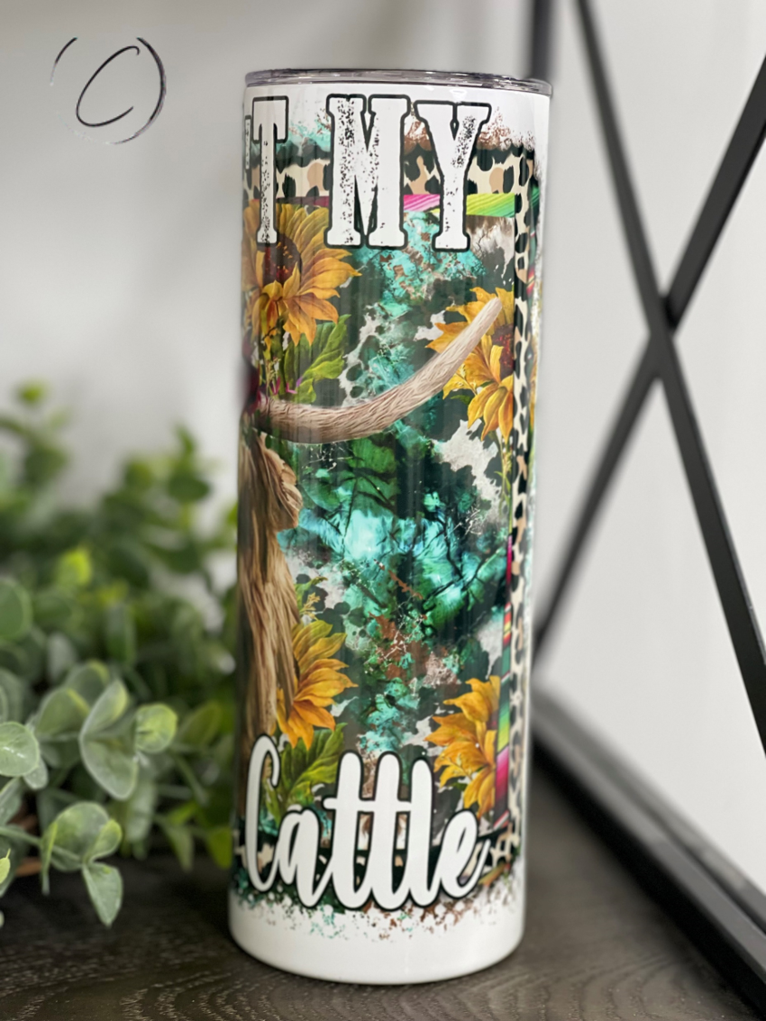 Ain't My Brand Of Cattle 20oz Skinny Tumbler featuring a stylish design, reusable straw, and durable construction.
